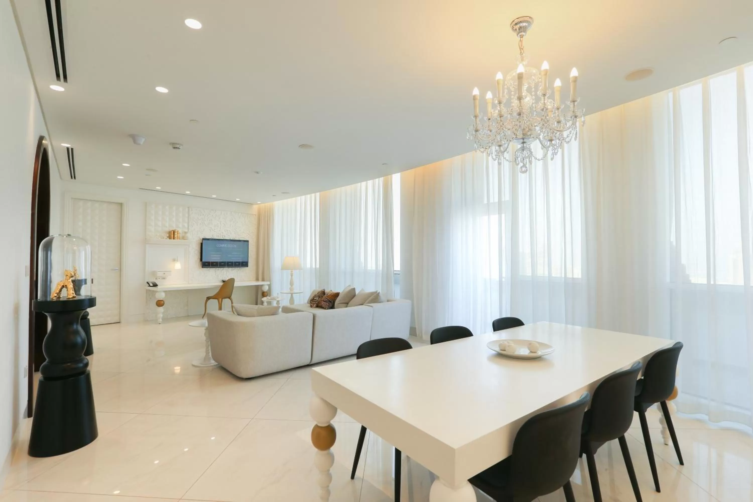 Communal lounge/ TV room in Mondrian Doha