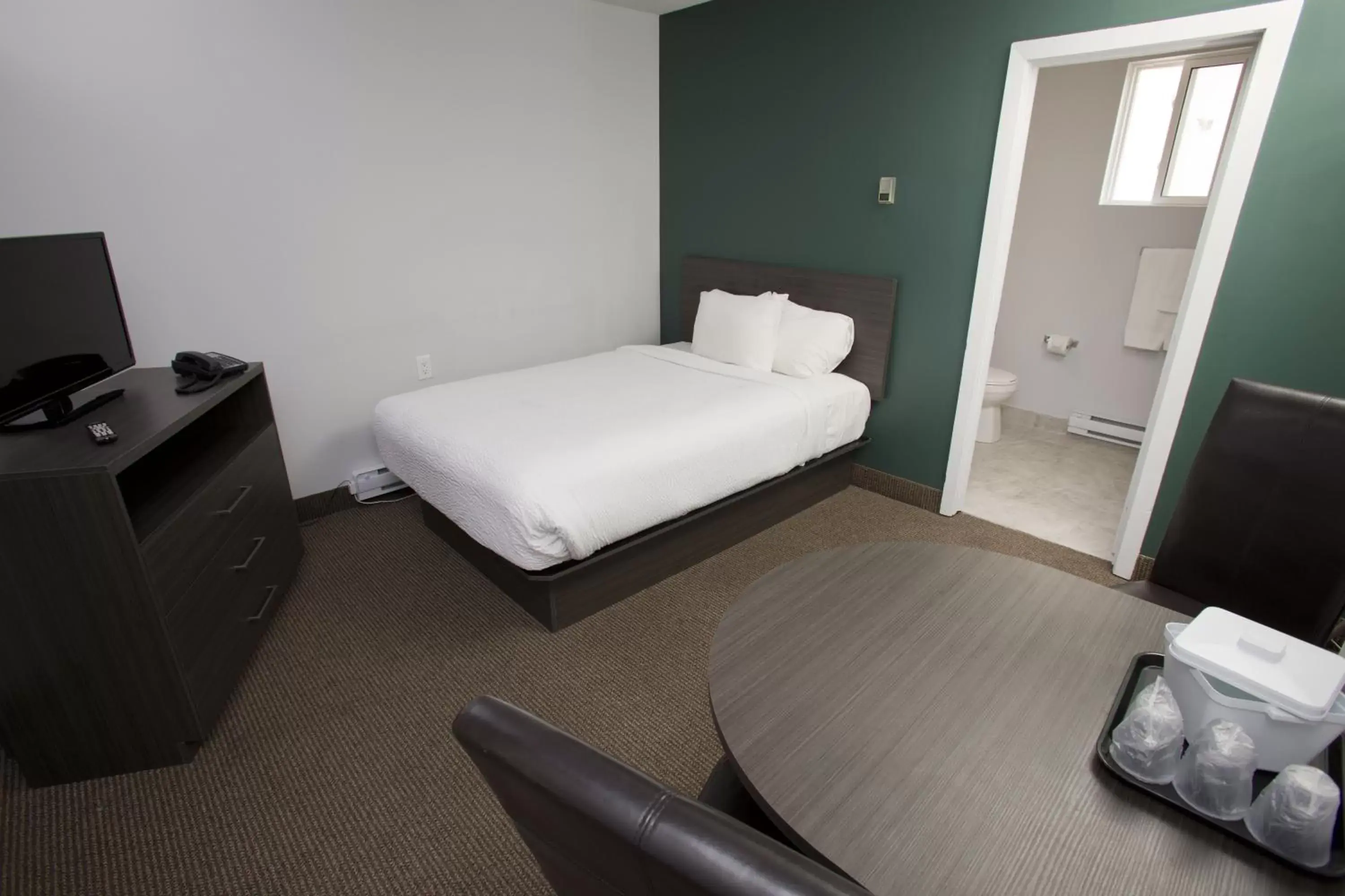 Photo of the whole room, Bed in The Falls Hotel & Inn