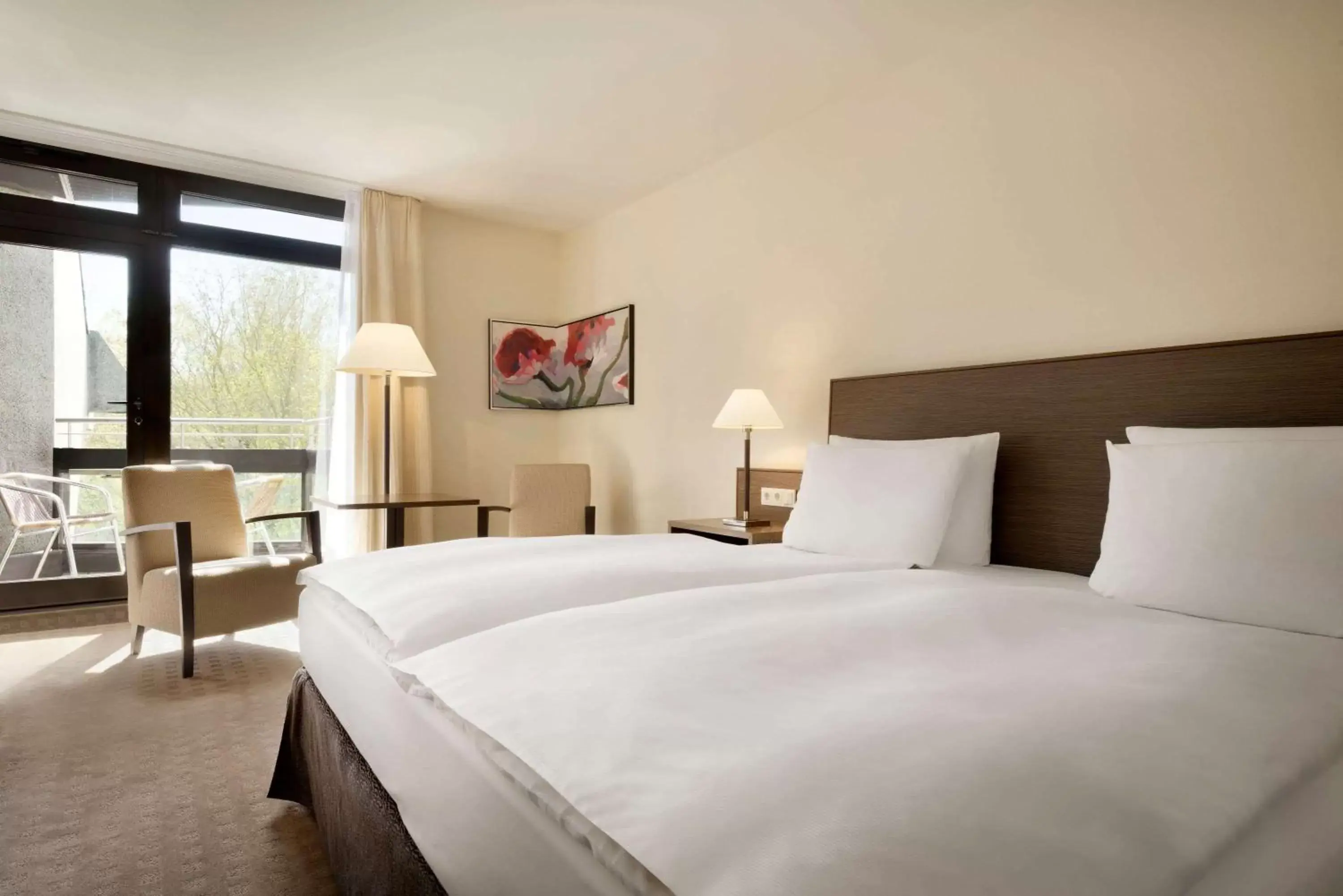 Photo of the whole room, Bed in Ramada Nuernberg Parkhotel