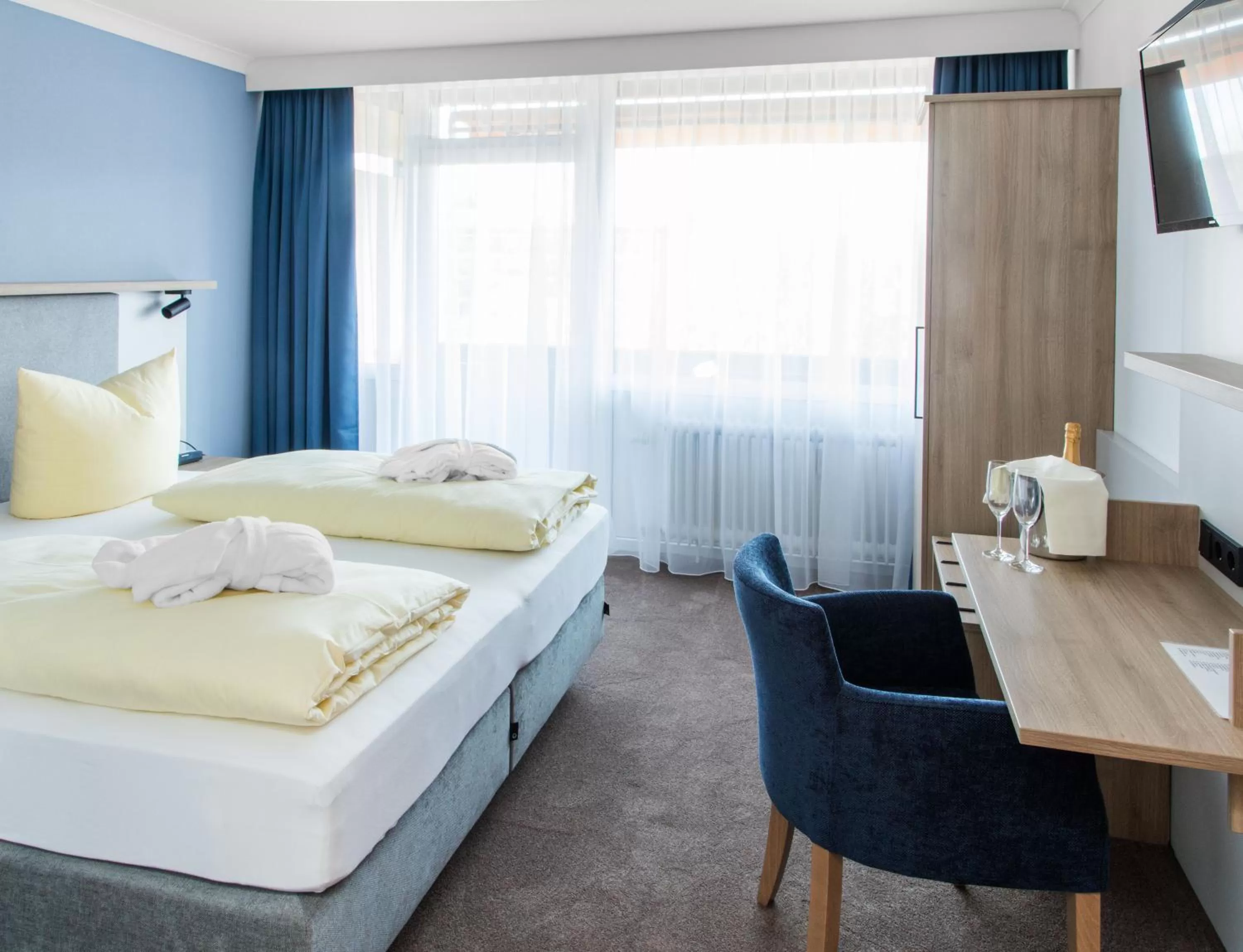 Photo of the whole room, Bed in Thermen-Hotel Rottaler Hof