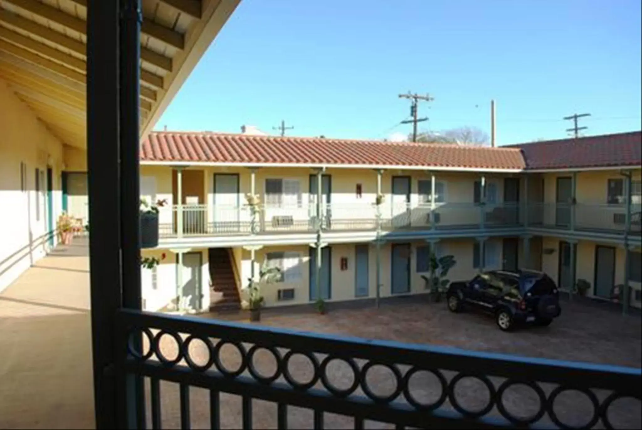Property building, Balcony/Terrace in Bella Capri Inn and Suites