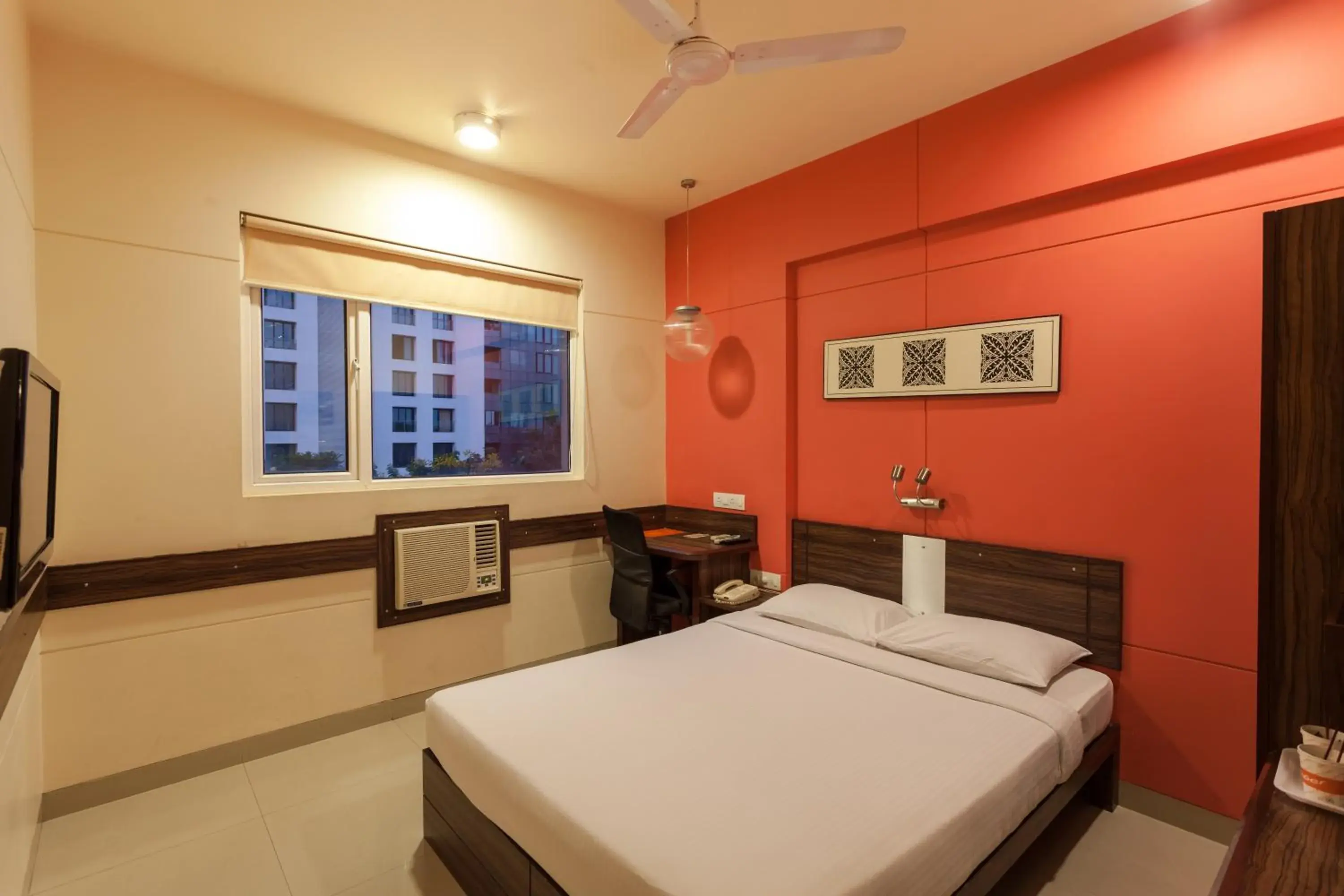 Bedroom in Ginger Hotel Surat