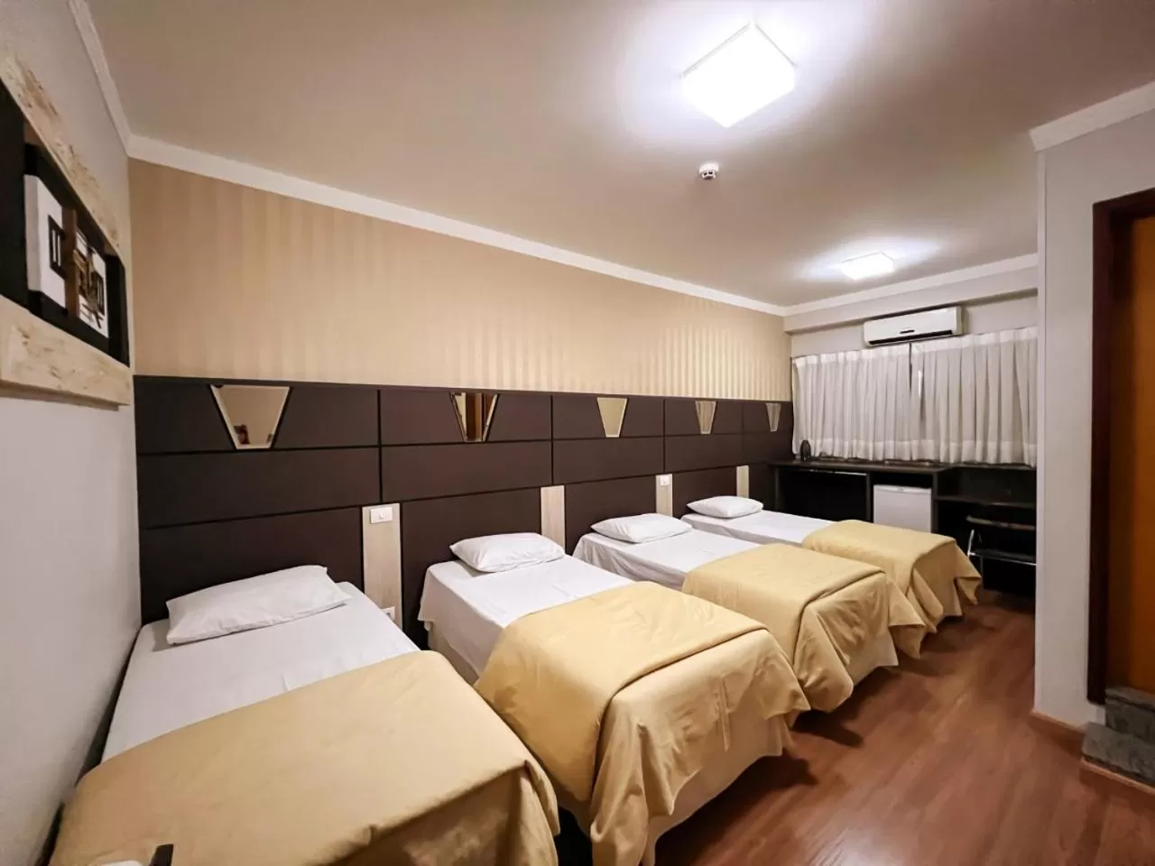 Bed in Paraná Comfort Hotel