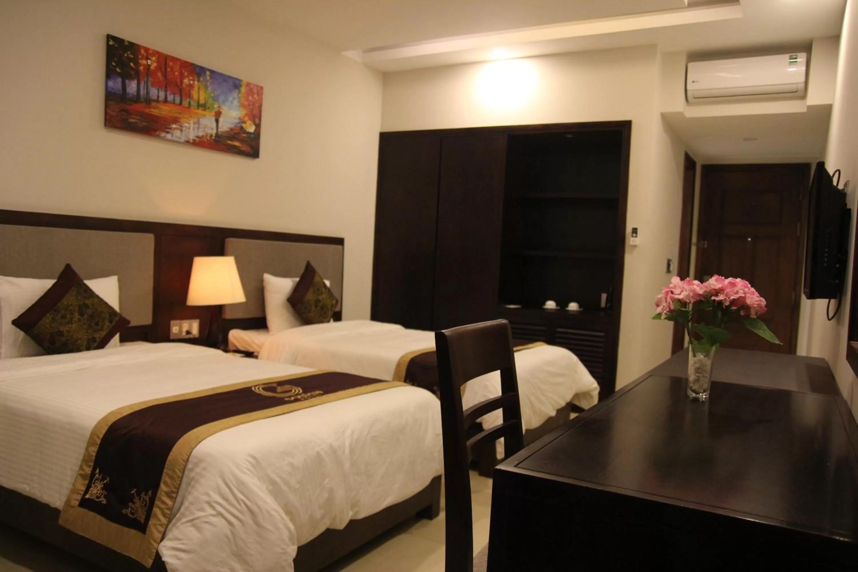 Bed in Golden Quang Tri Hotel