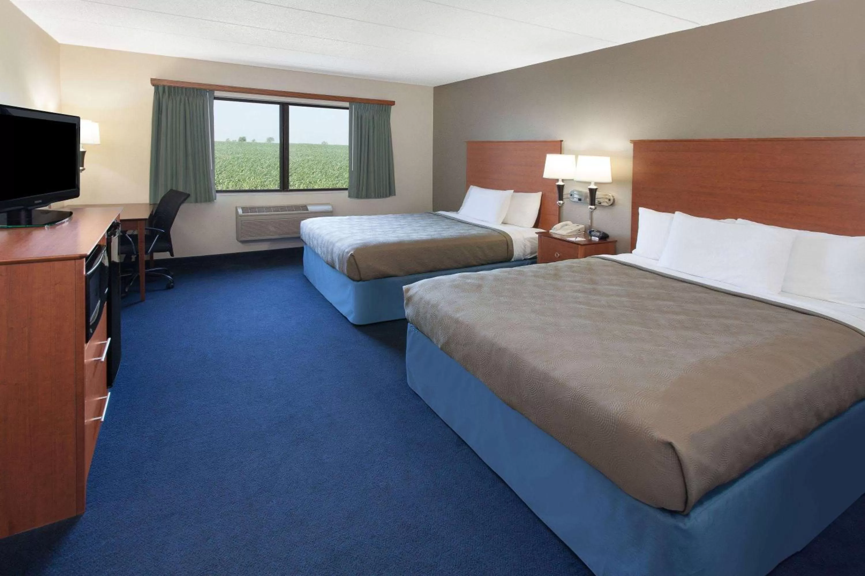 Photo of the whole room, Bed in AmericInn by Wyndham Webster City