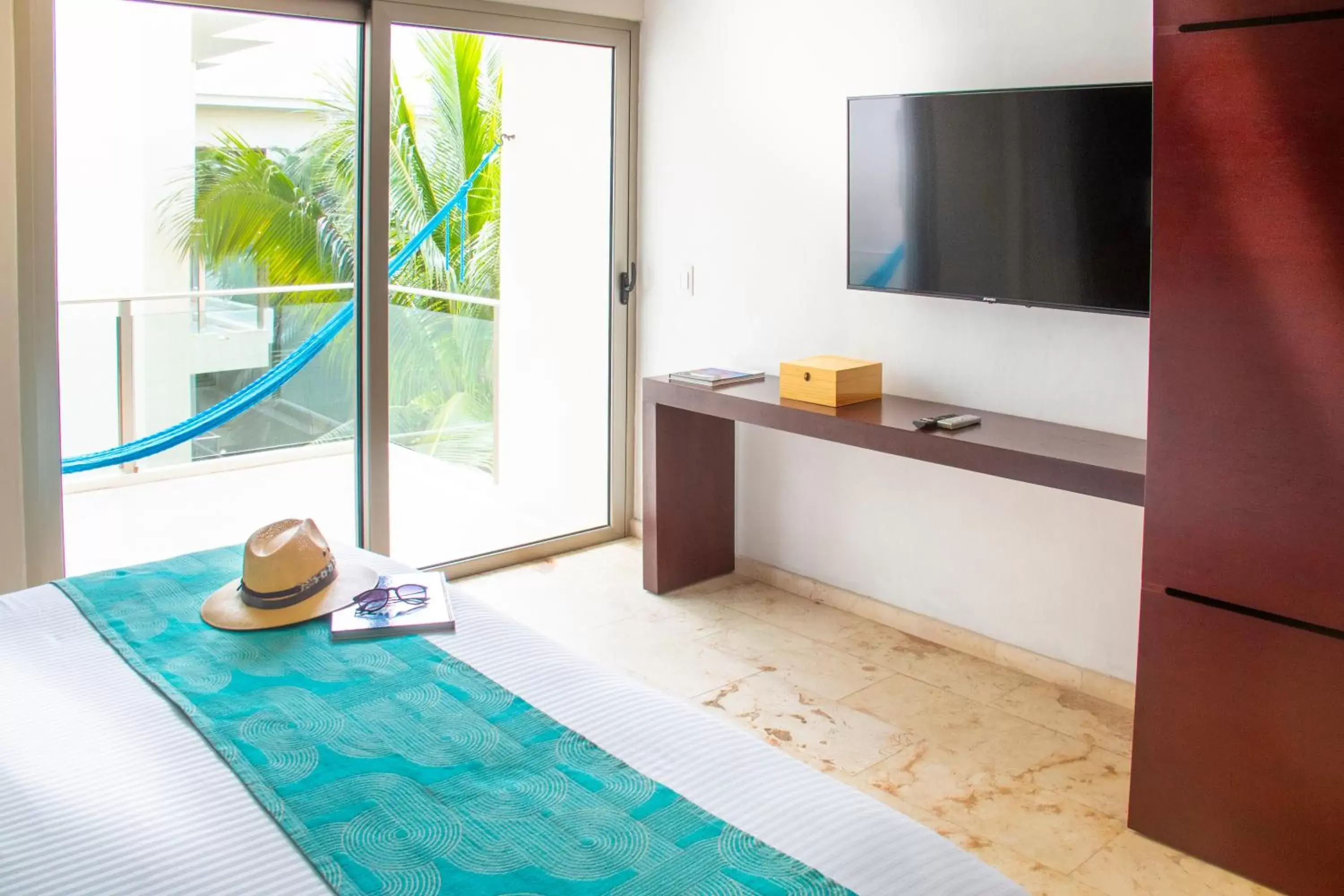 Bedroom, TV/Entertainment Center in The Palm at Playa