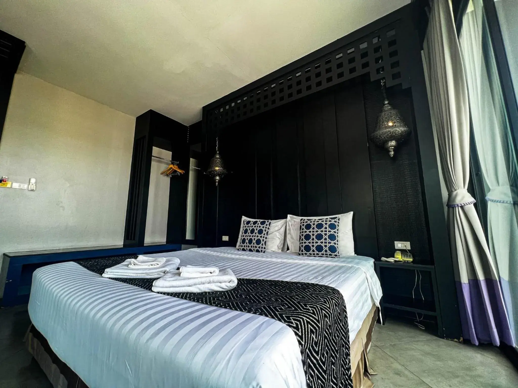 Bed in Srisawara Casa Hotel