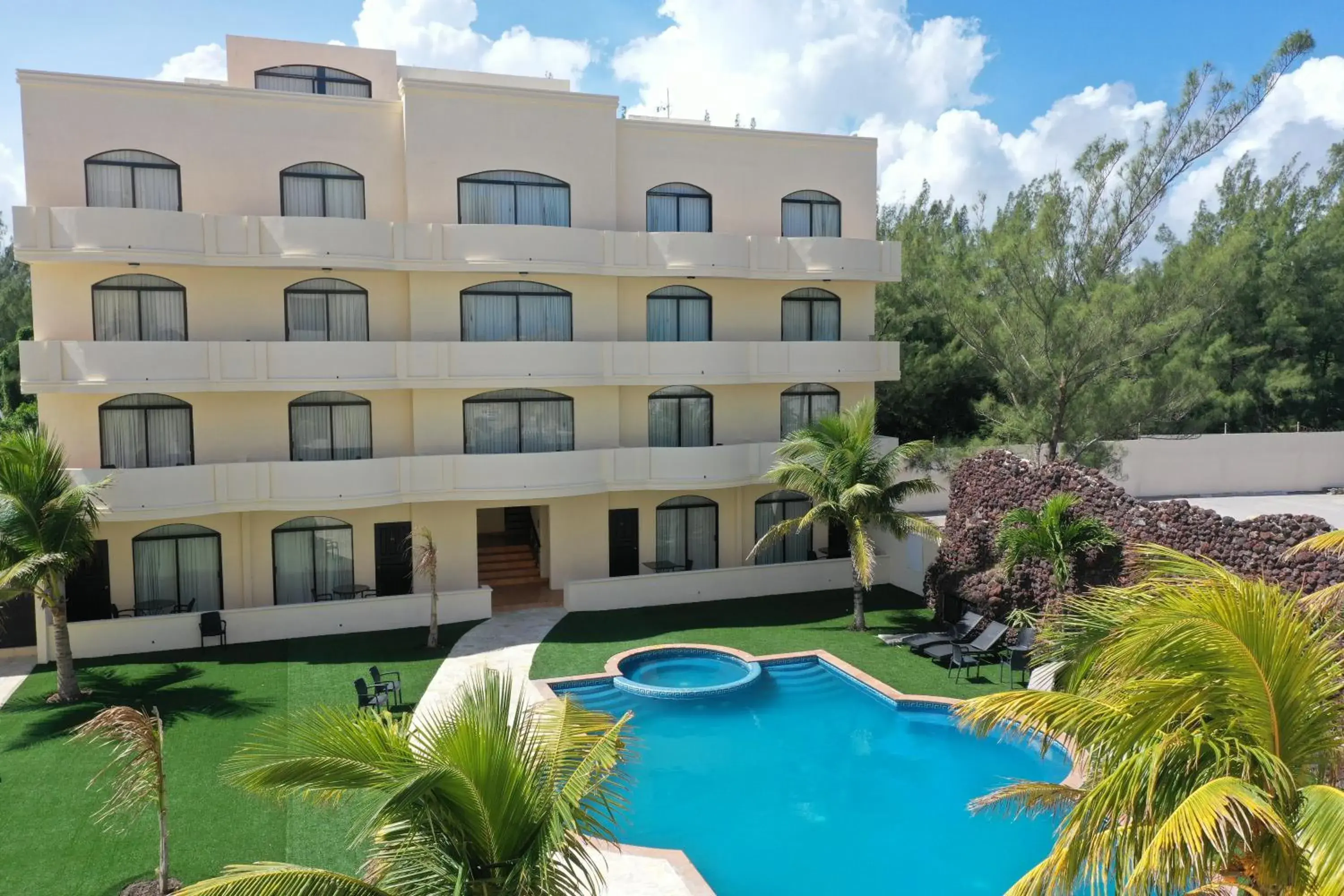 Property building, Swimming Pool in Hotel Arenas Del Mar Resort