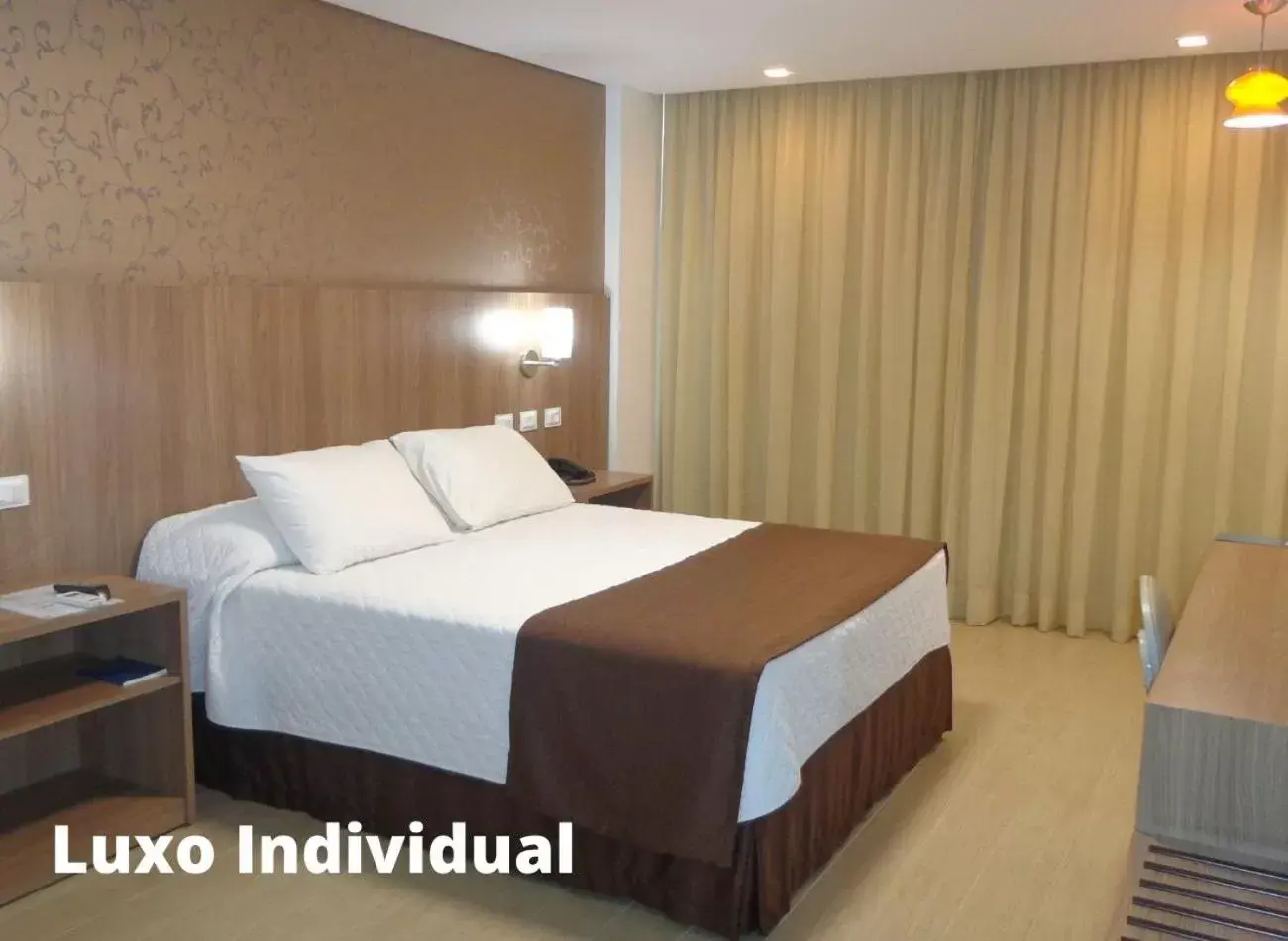 Bed in Foz Presidente Comfort Hotel
