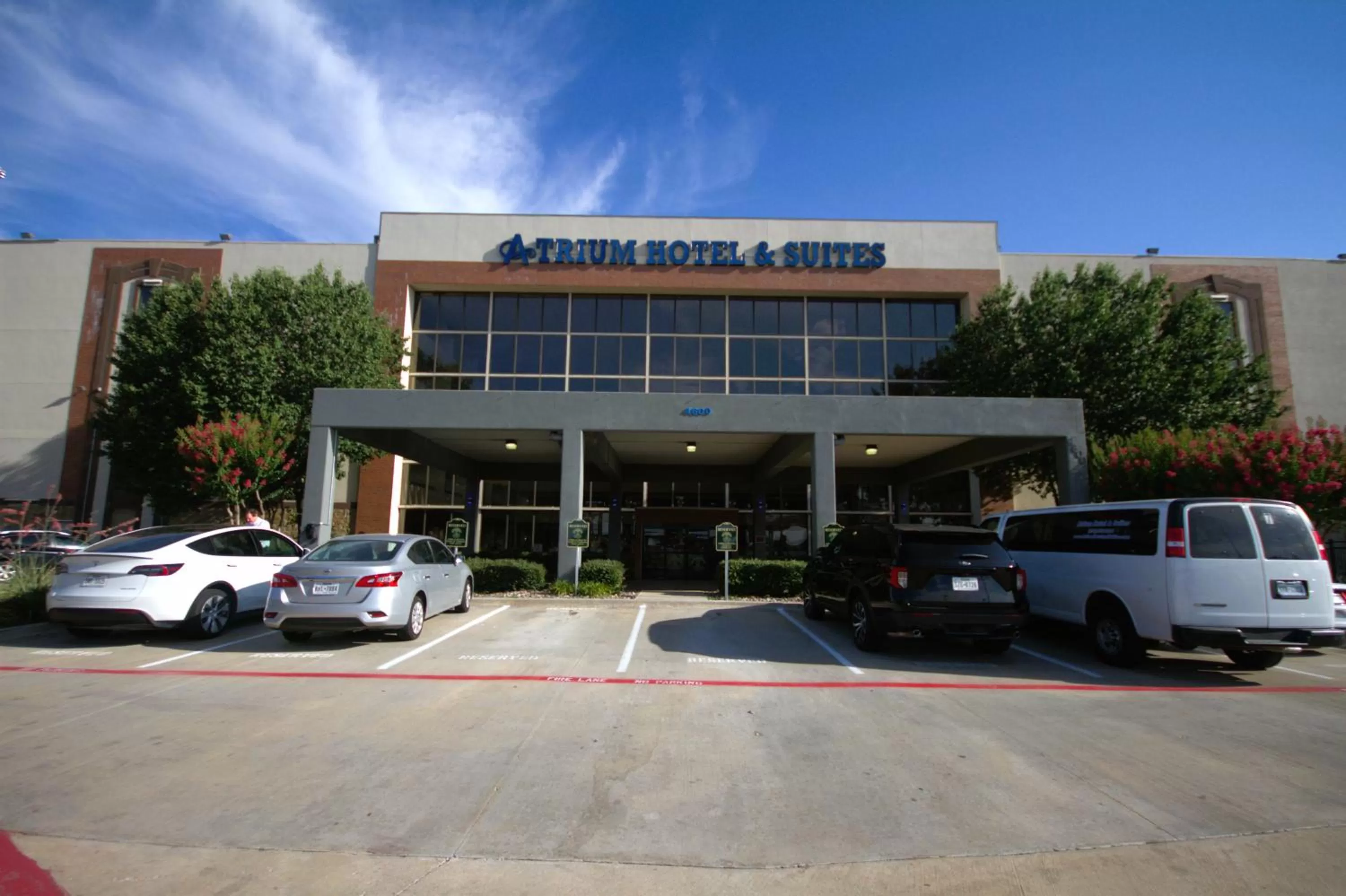 Property building in Atrium Hotel and Suites DFW Airport