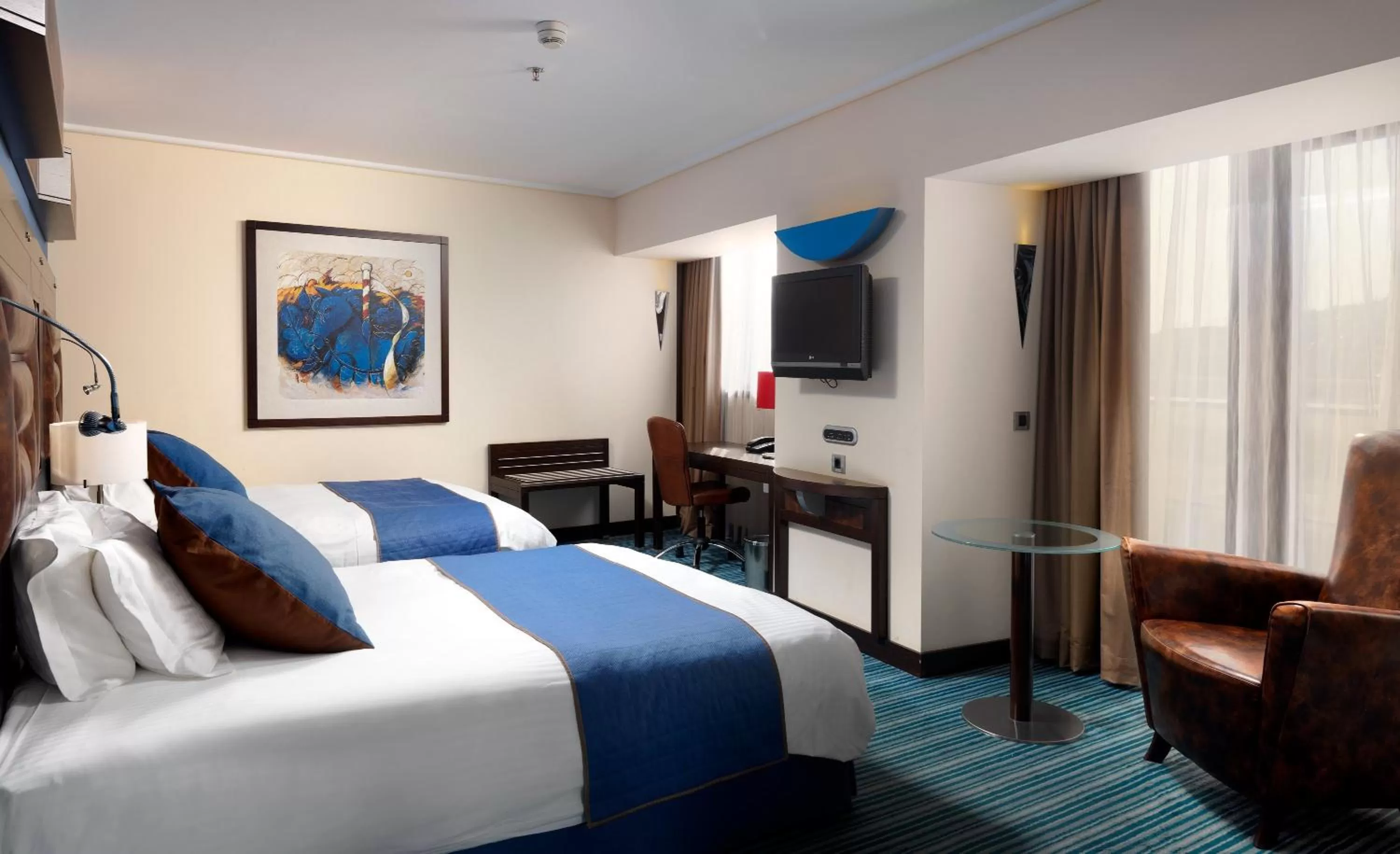 Photo of the whole room, Bed in Crowne Plaza Athens City Centre by IHG