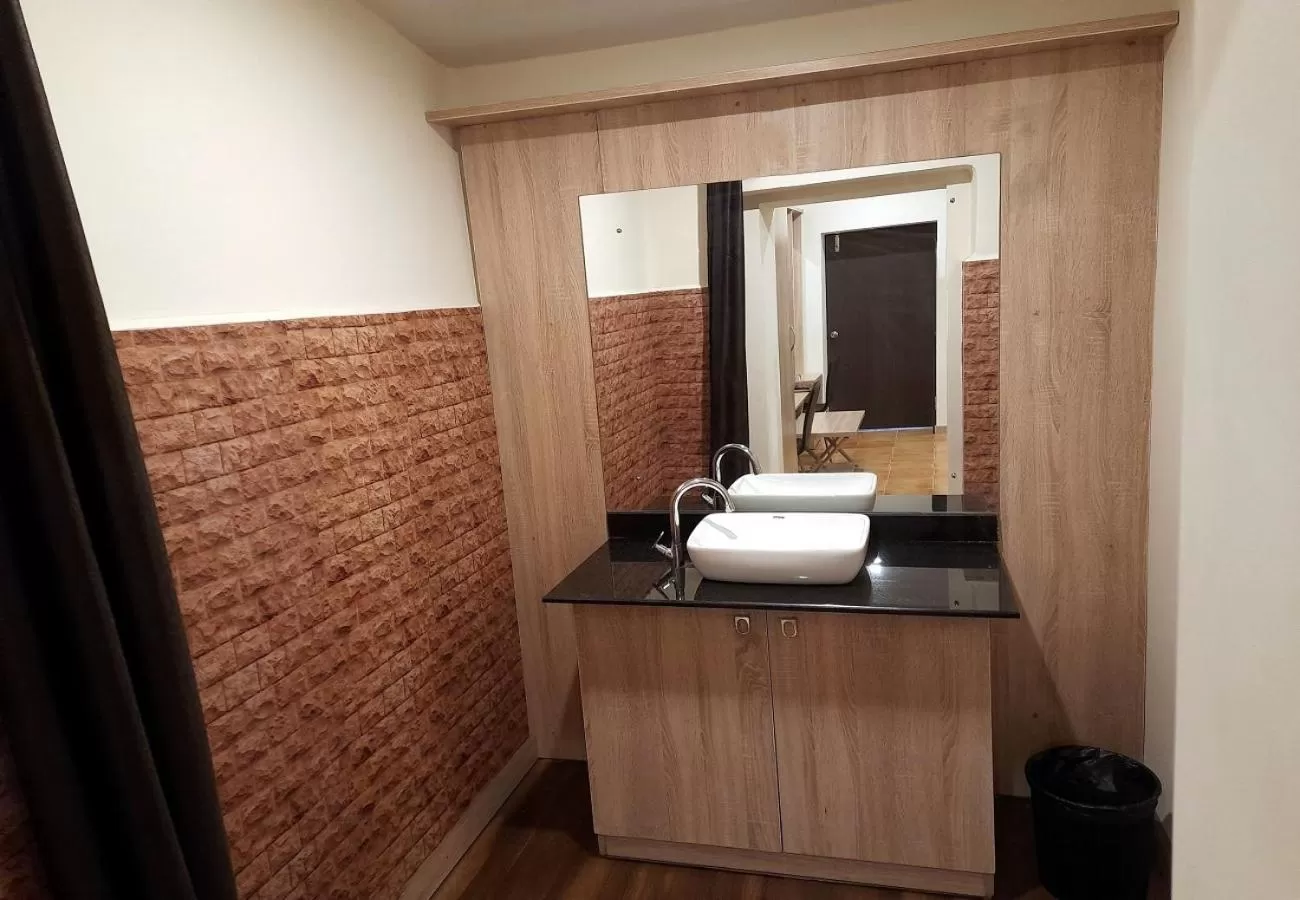 Bathroom in GRAND KODAI SR INN