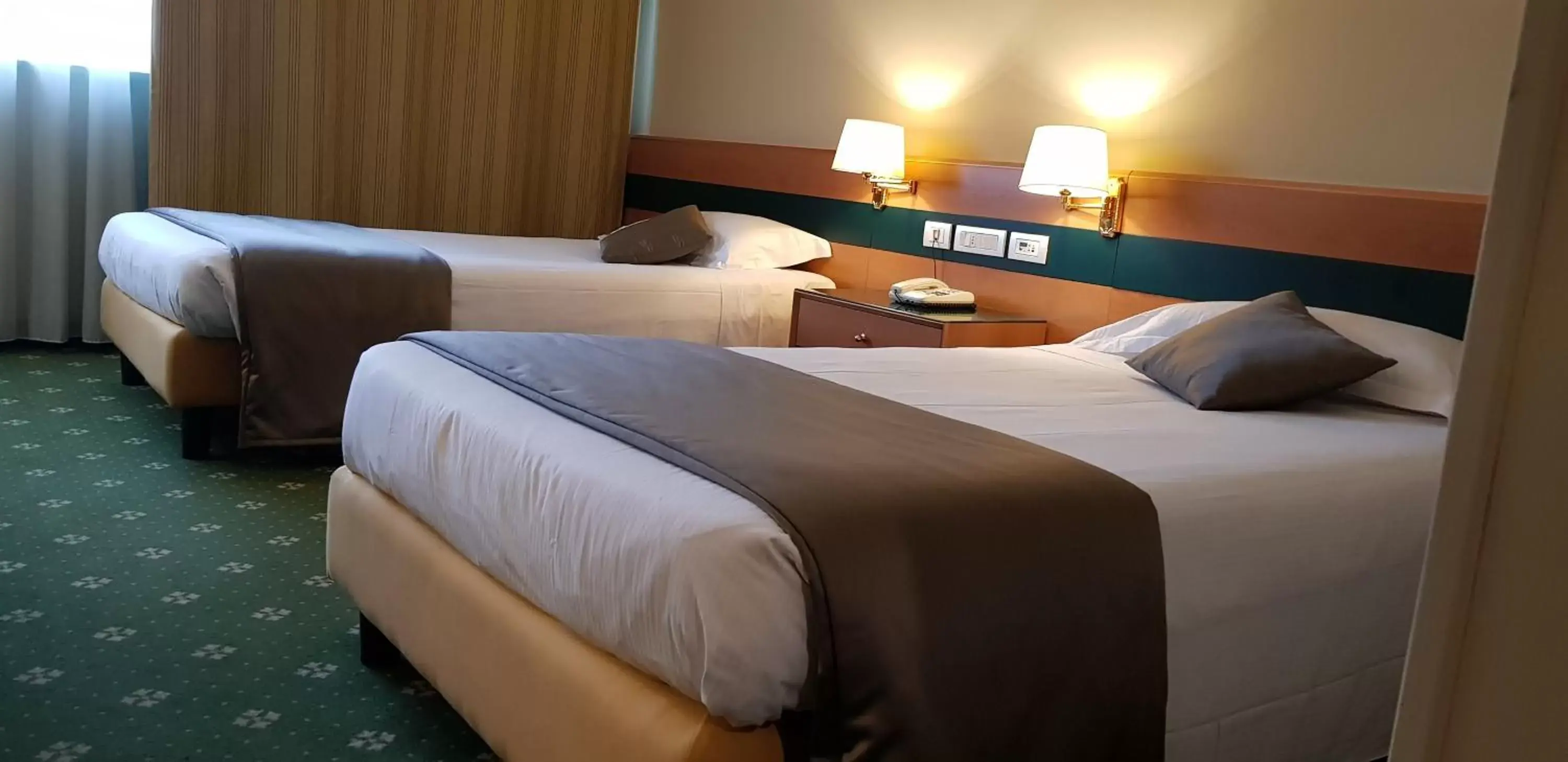 Bed in BV Hotel Oly