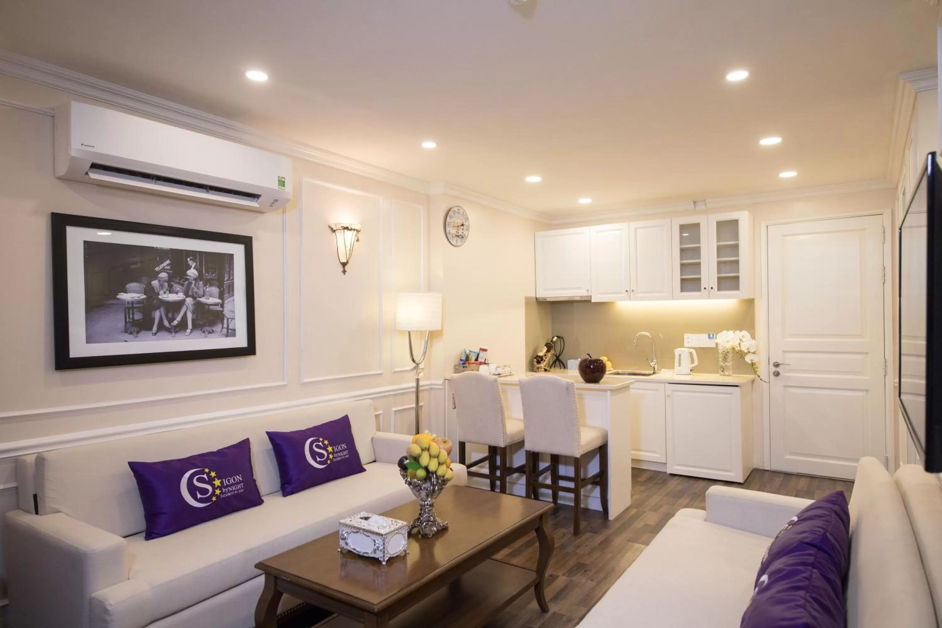 Living room in Saigon By Night Luxury Hotel