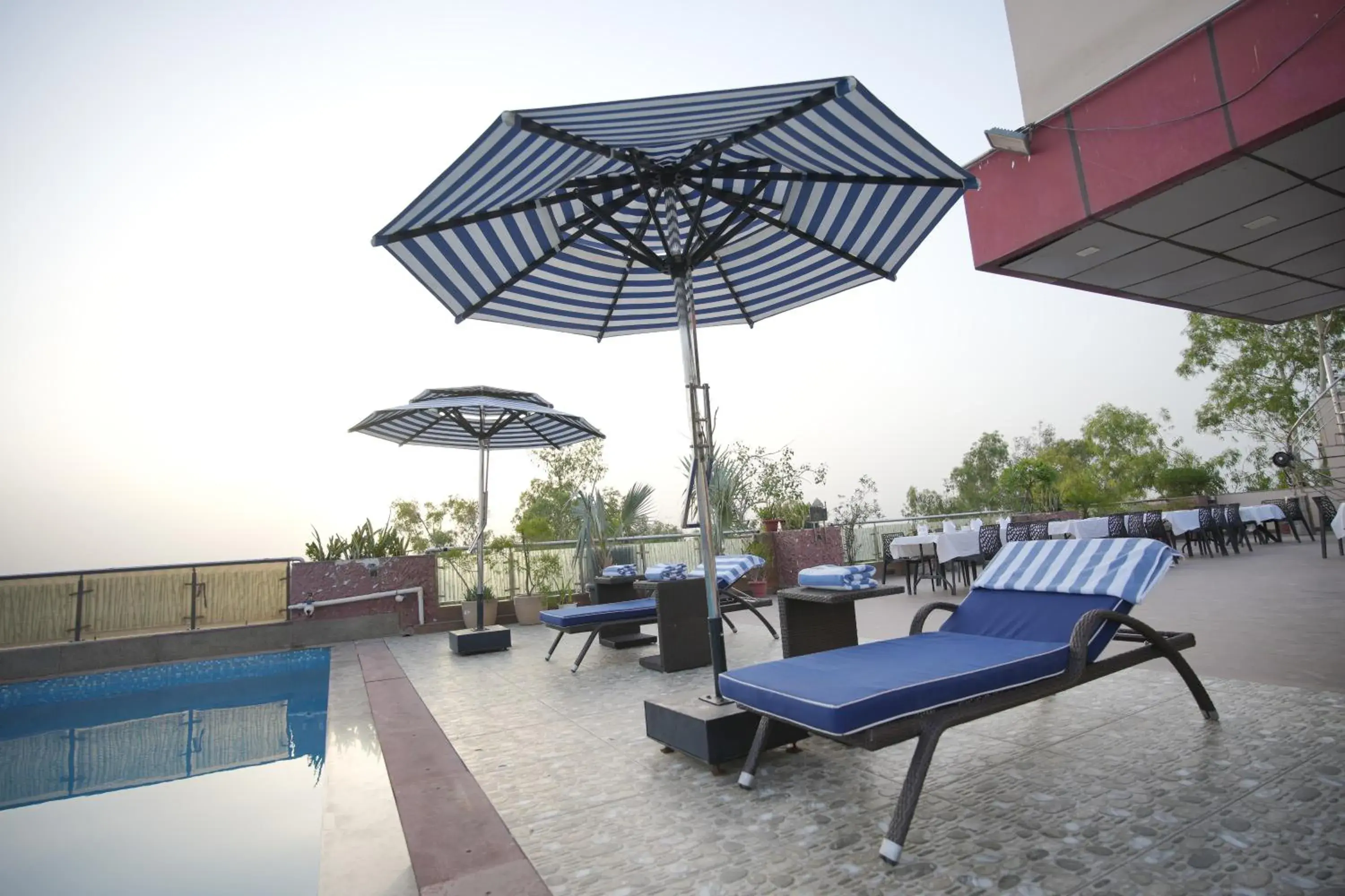 Patio, Swimming Pool in Hotel Atulyaa Taj