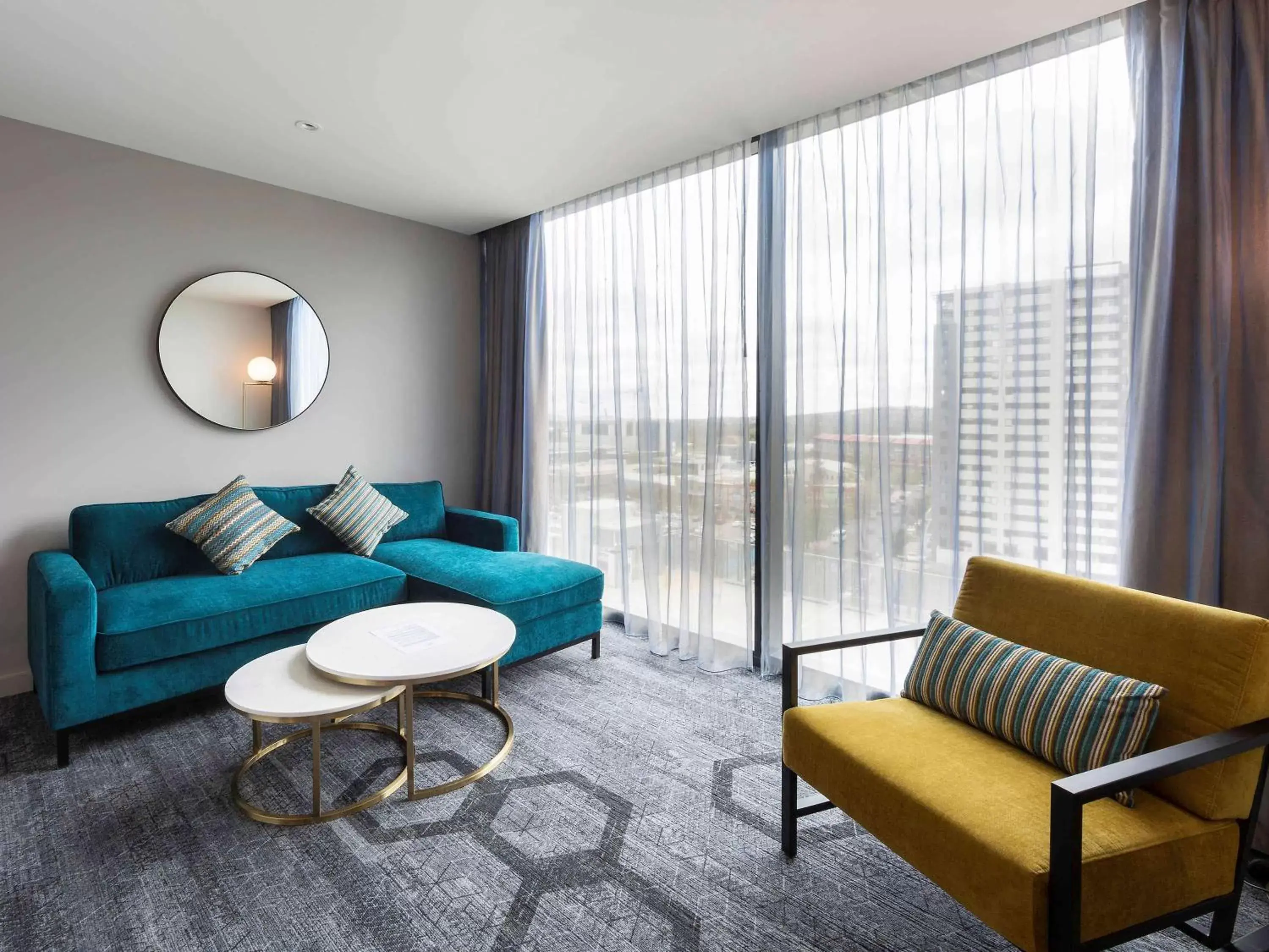 Photo of the whole room, Seating Area in Mercure Canberra Belconnen