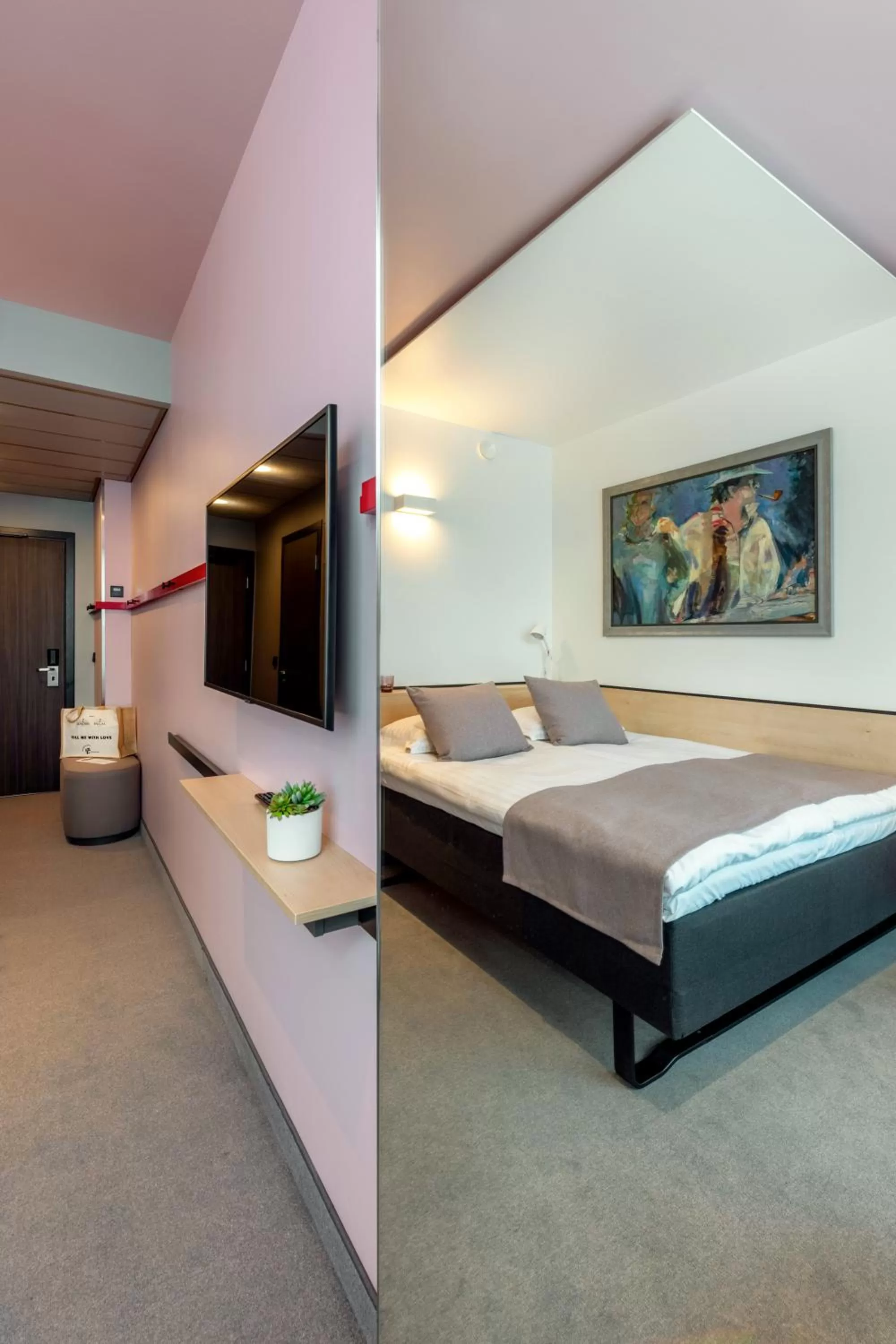 Bed in Art Hotel Pallas by Tartuhotels