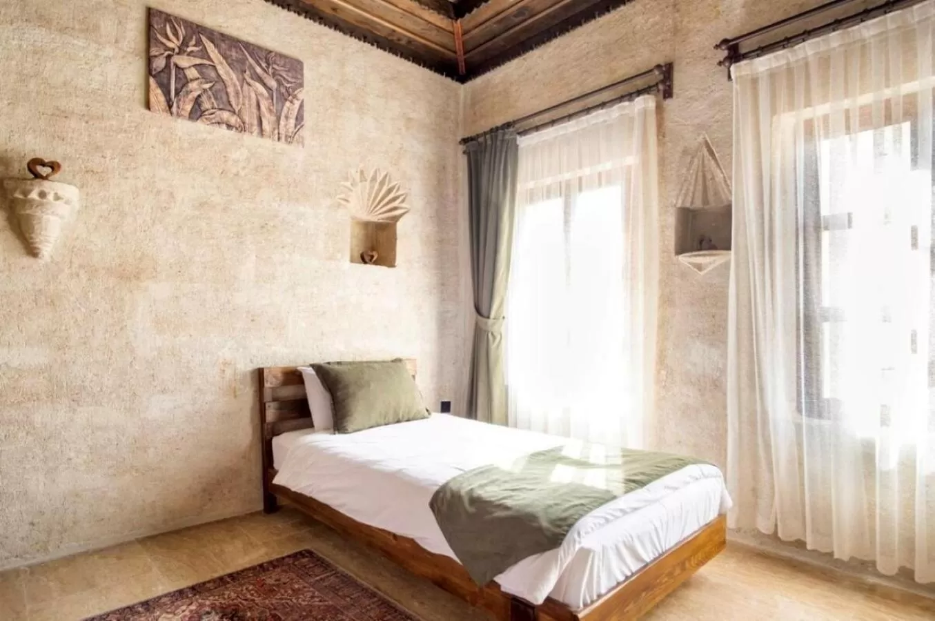 Bed in Uzay Cave Suite Hotel