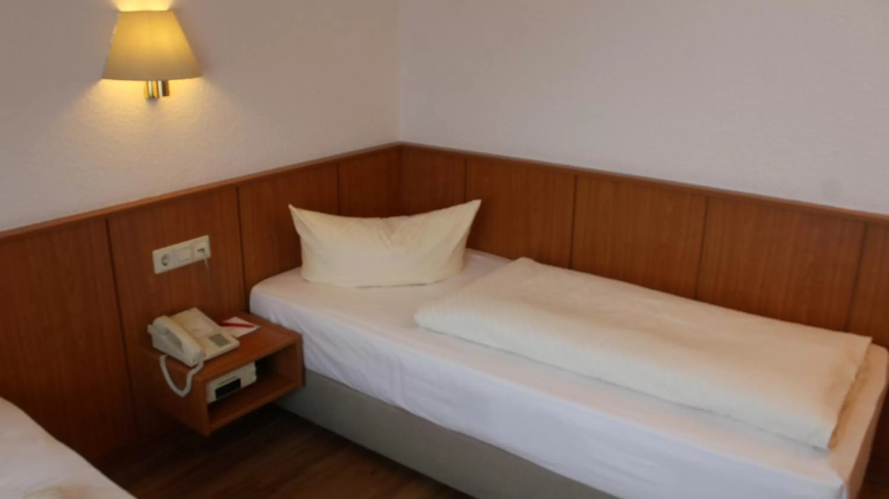 Bed in Hotel Weisser Schwan
