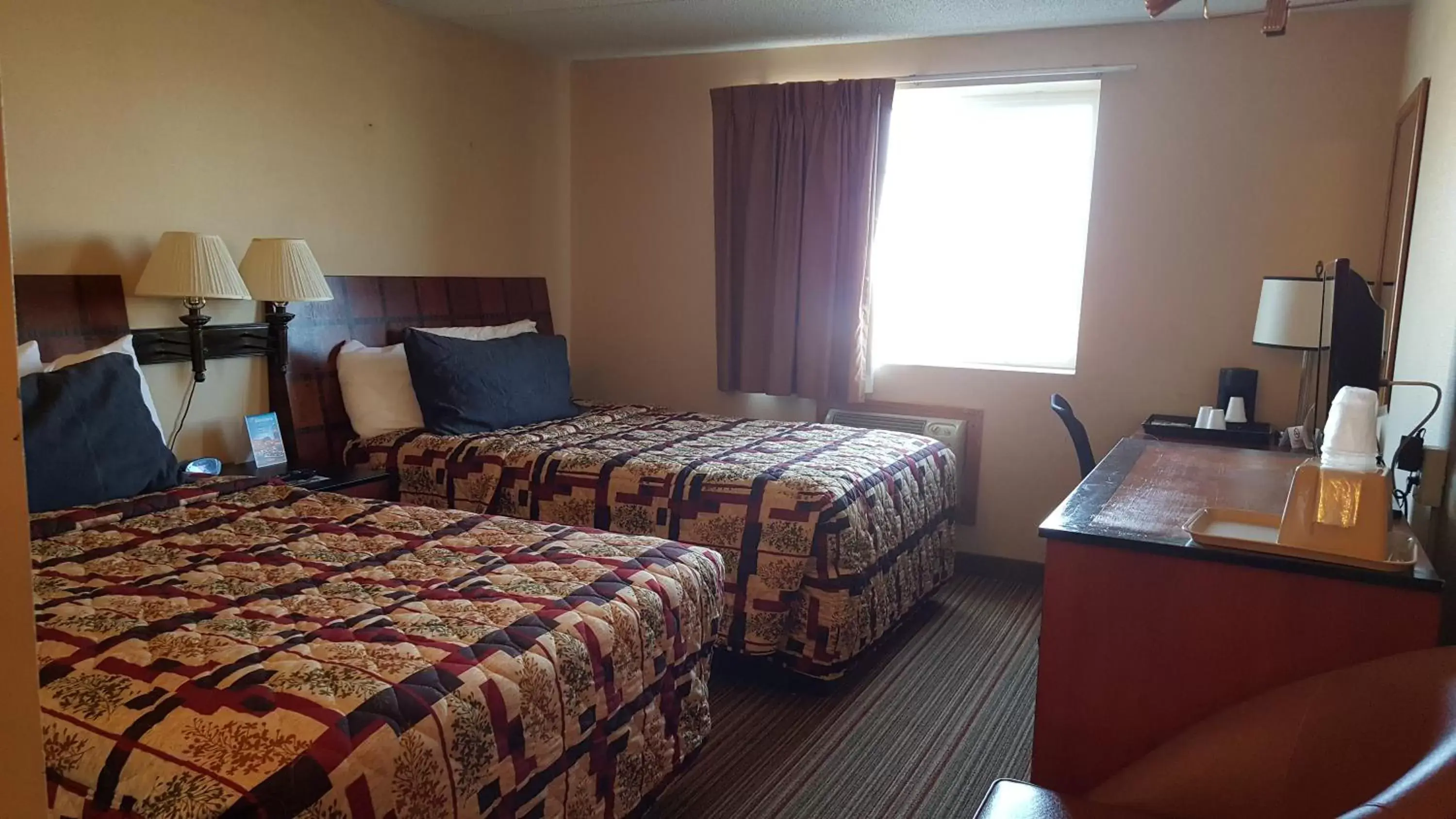 Bed in Knights Inn and Suites - Grand Forks