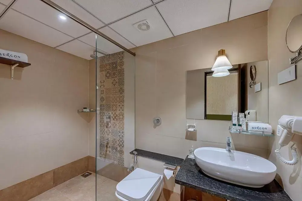 Shower, Bathroom in Guruprerna Beacon Resort, Dwarka