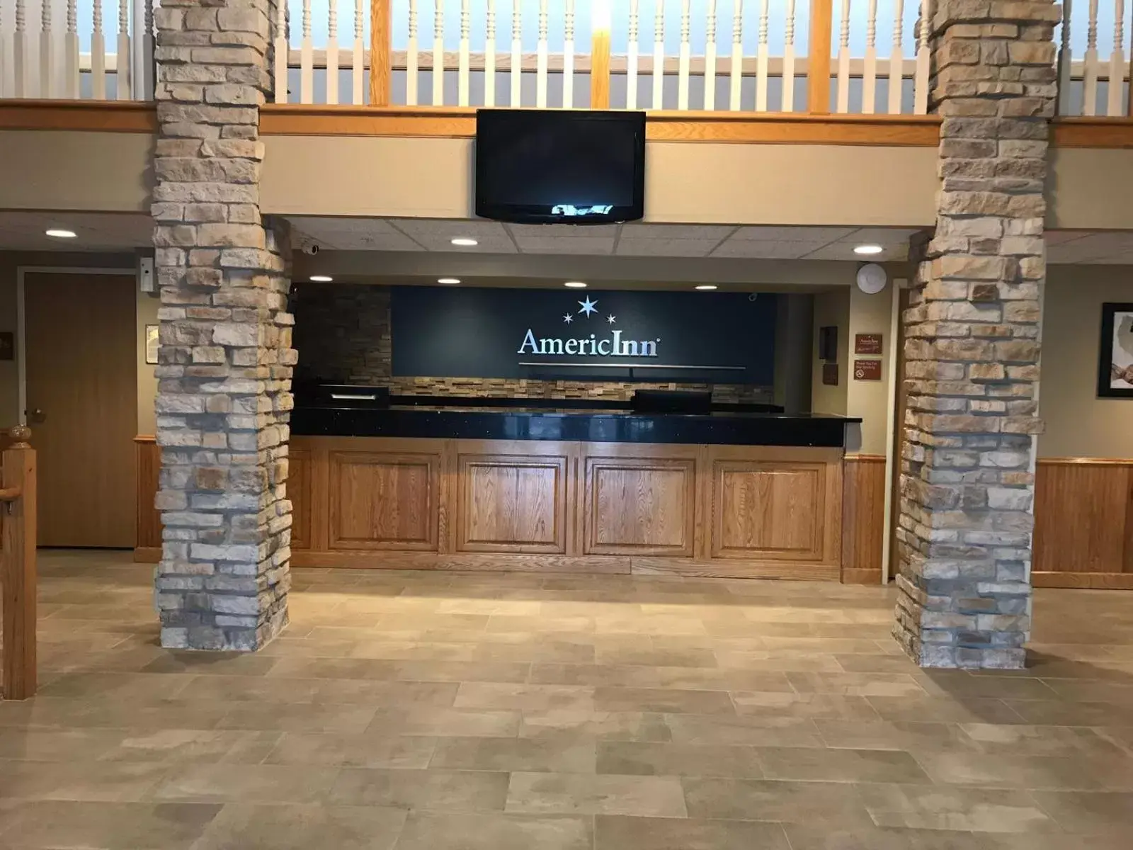 Lobby or reception in AmericInn by Wyndham Hotel and Suites Long Lake