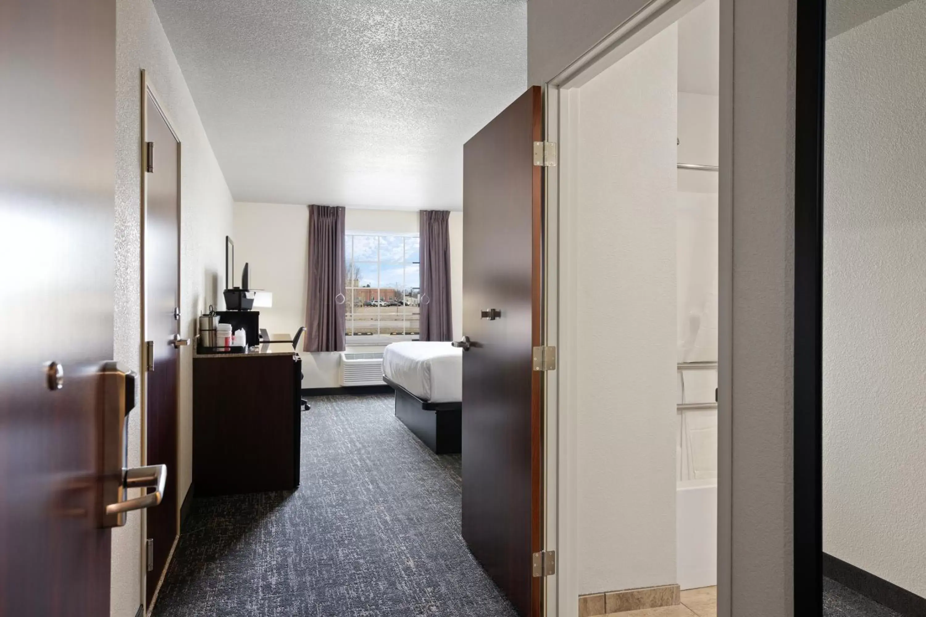 Bed in Cobblestone Inn & Suites - Yuma