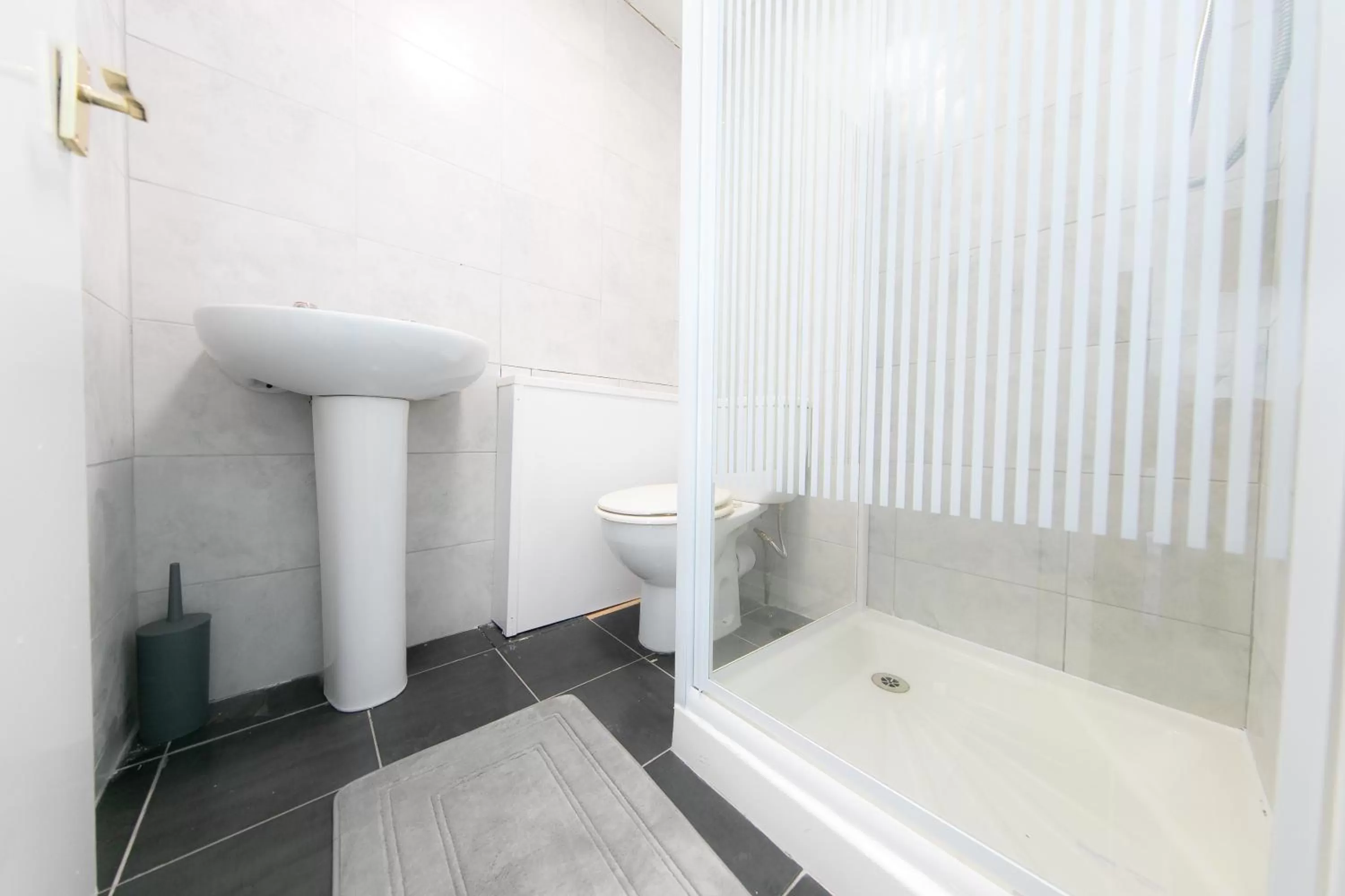 Bathroom in The New Apollo Hotel