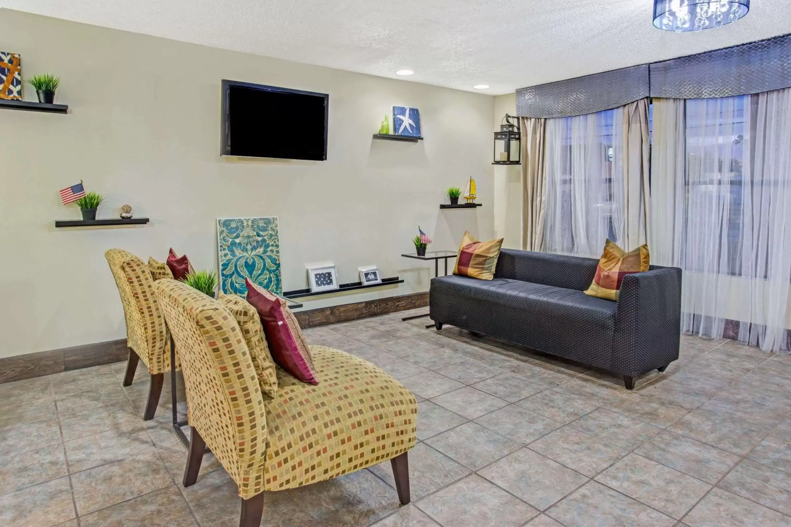 Lobby or reception, Seating Area in Days Inn by Wyndham Great Lakes - N. Chicago