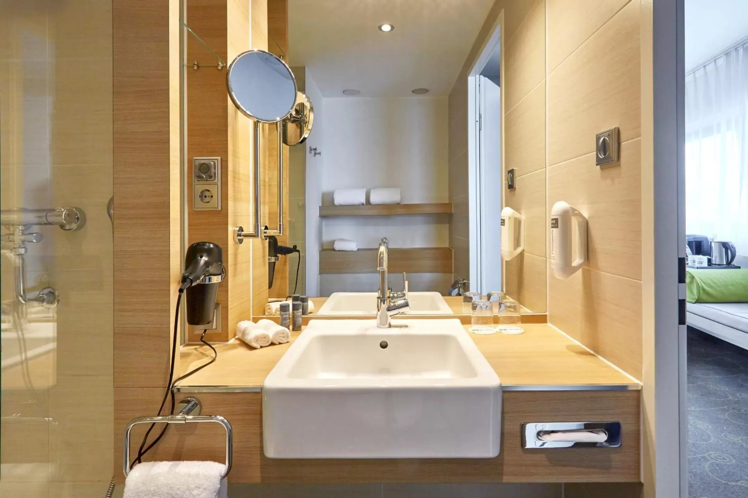 Bathroom in H+ Hotel Salzburg