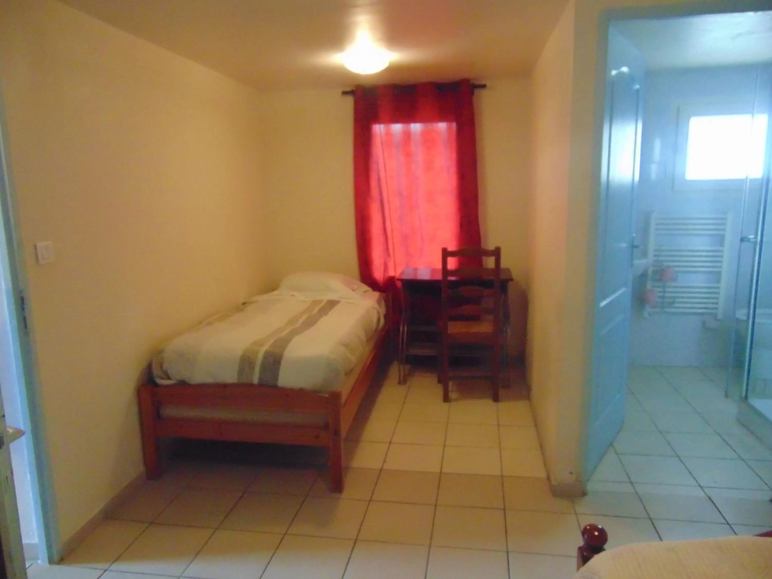 Bed in Le Relais de la RN7