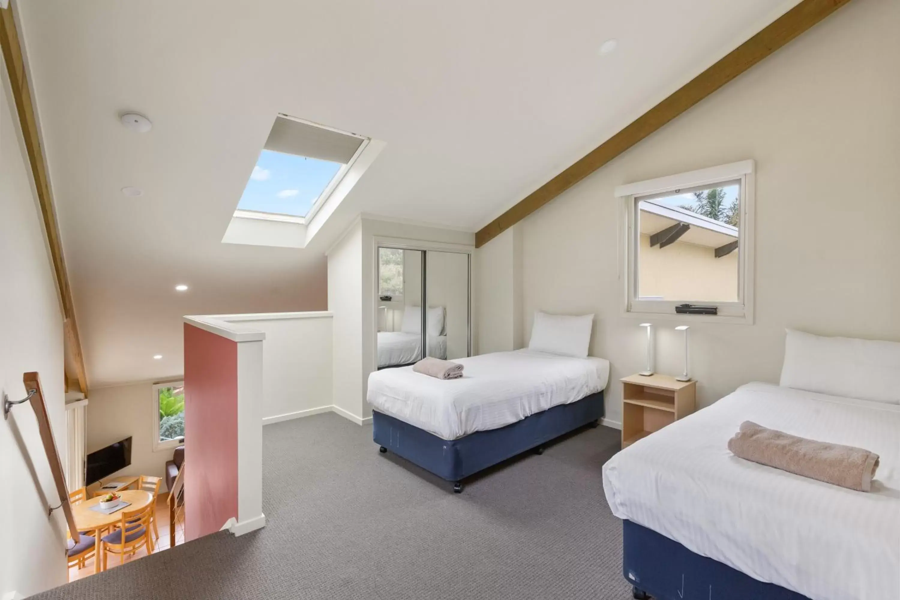 Bed in Tathra Beach House Holiday Apartments