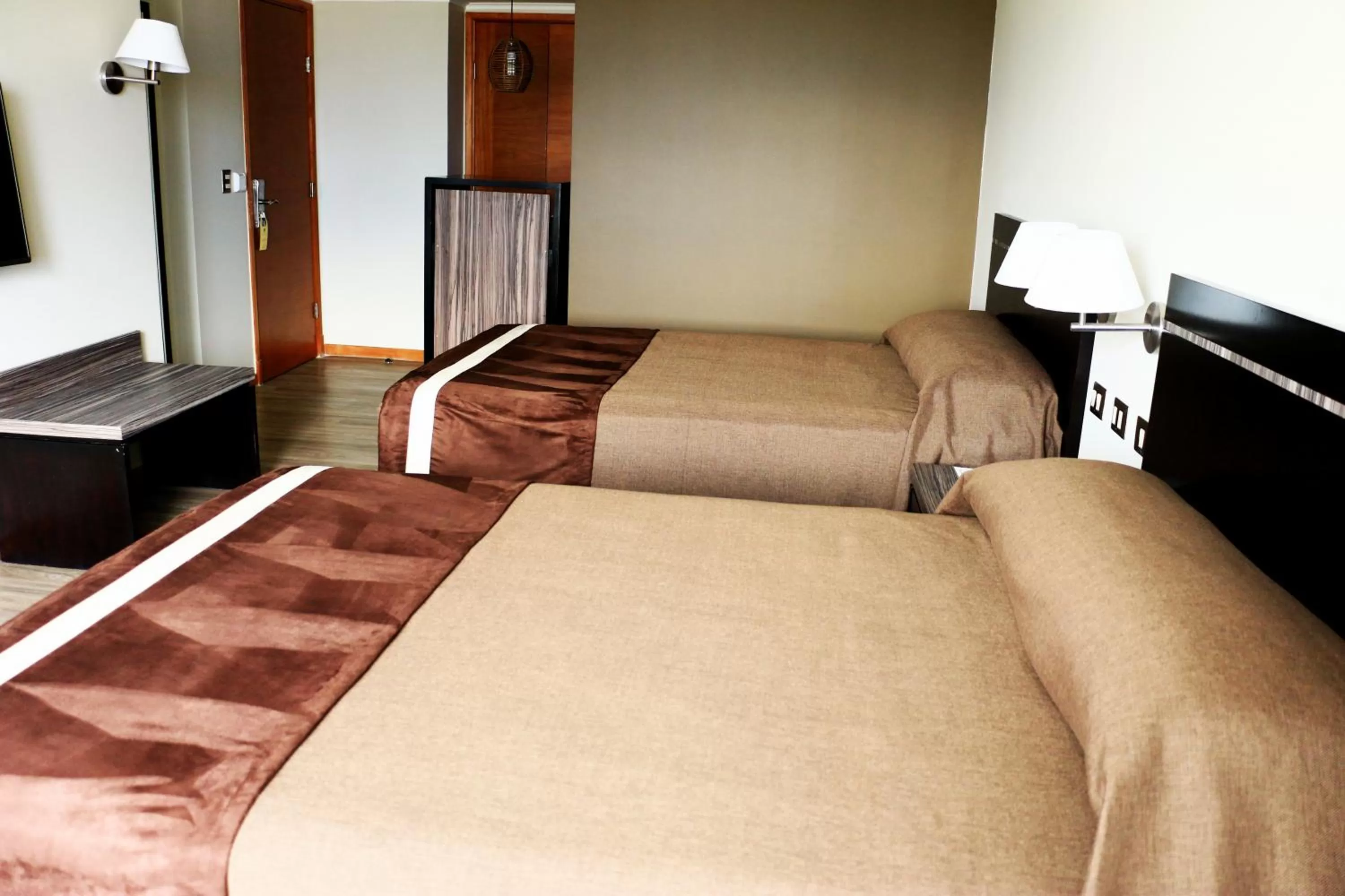 Decorative detail, Bed in Hotel Diego de Almagro Providencia