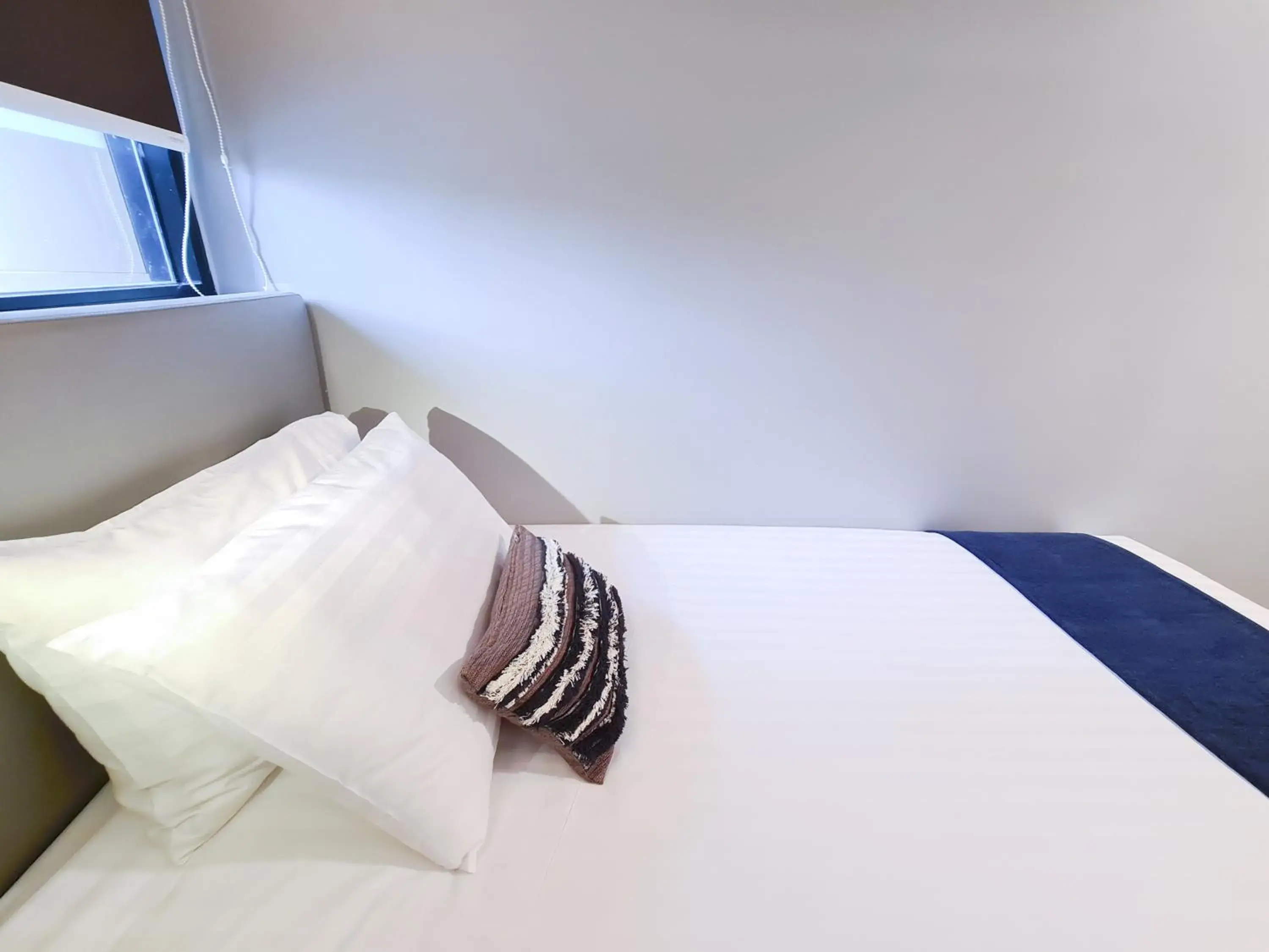 Bed in SOVA Hotel Bangkok