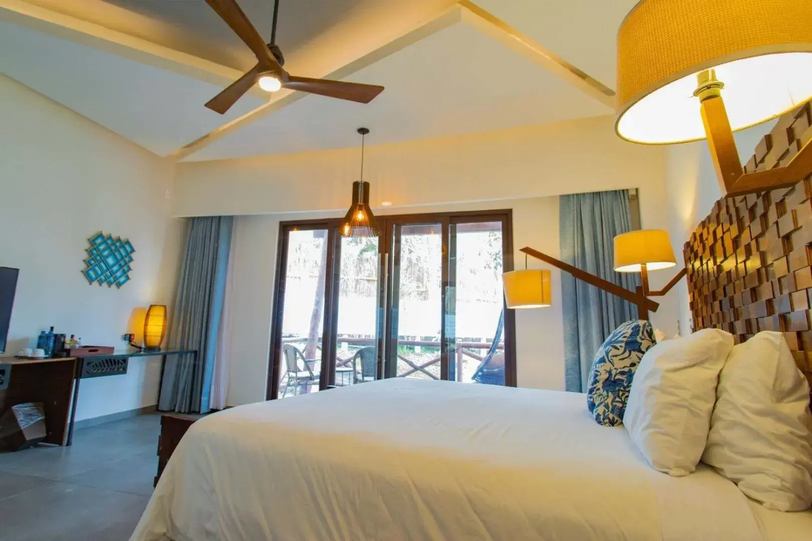 Bed in Mia Bacalar Luxury Resort & Spa