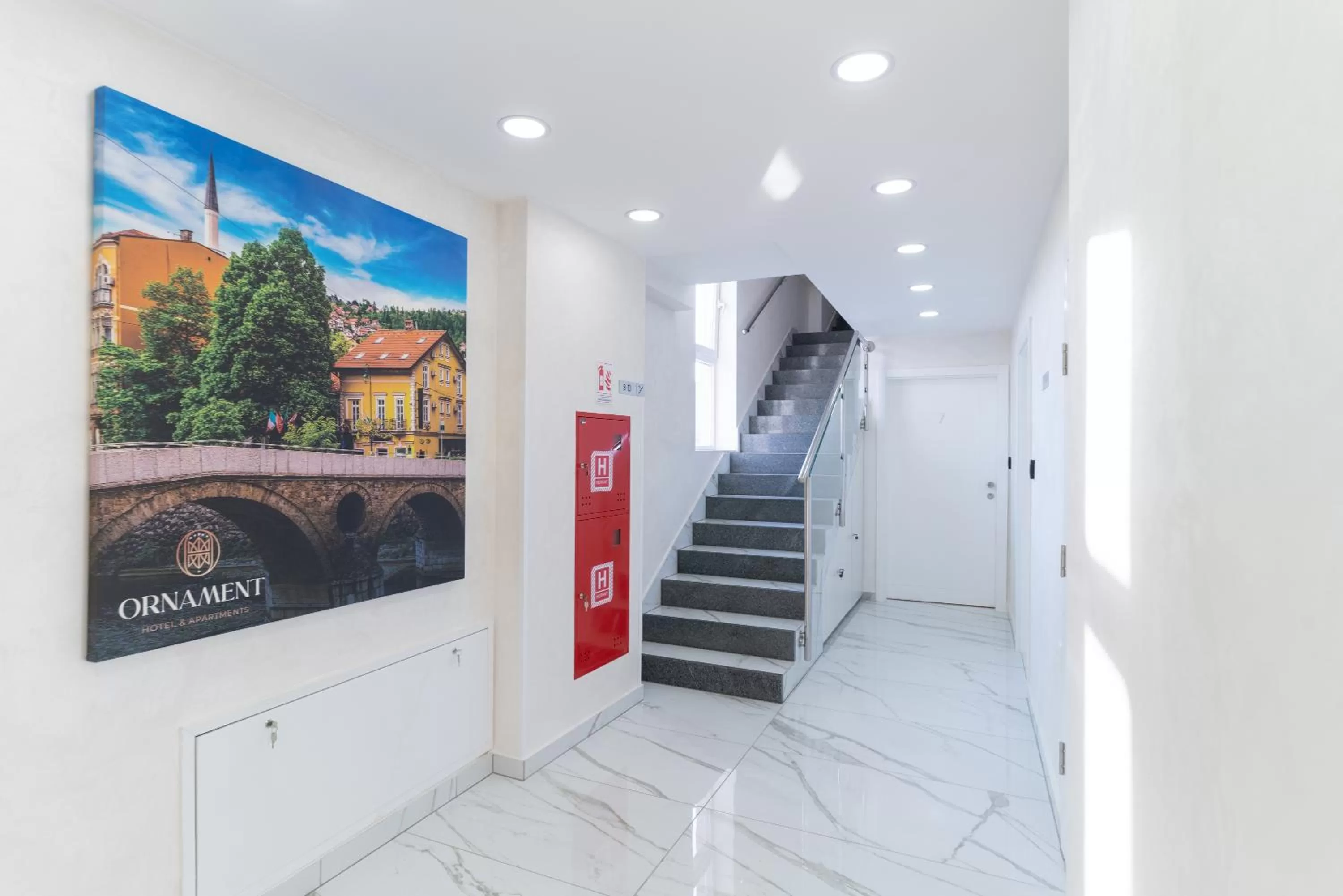 Text overlay in Ornament Hotel and Apartments