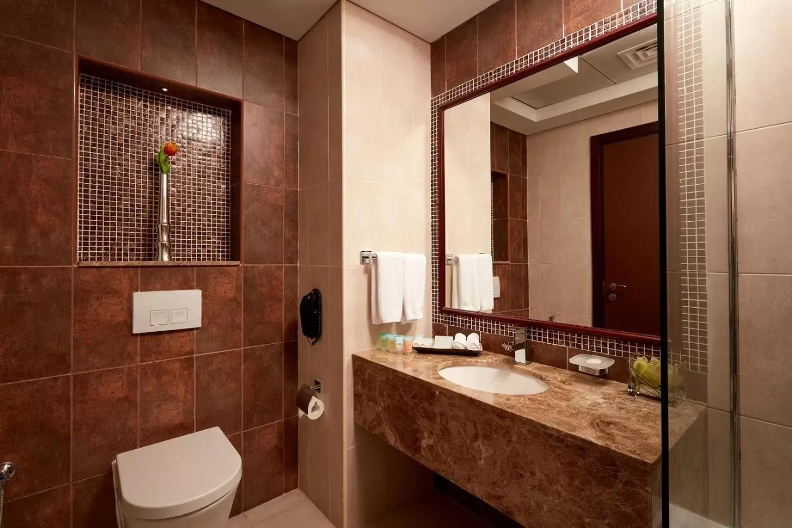 Bathroom in Treppan Hotel & Suites By Fakhruddin
