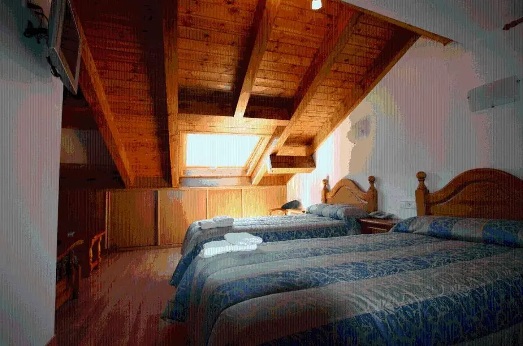 Bed in Hotel Can Mestre Bed in Hotel Can Mestre