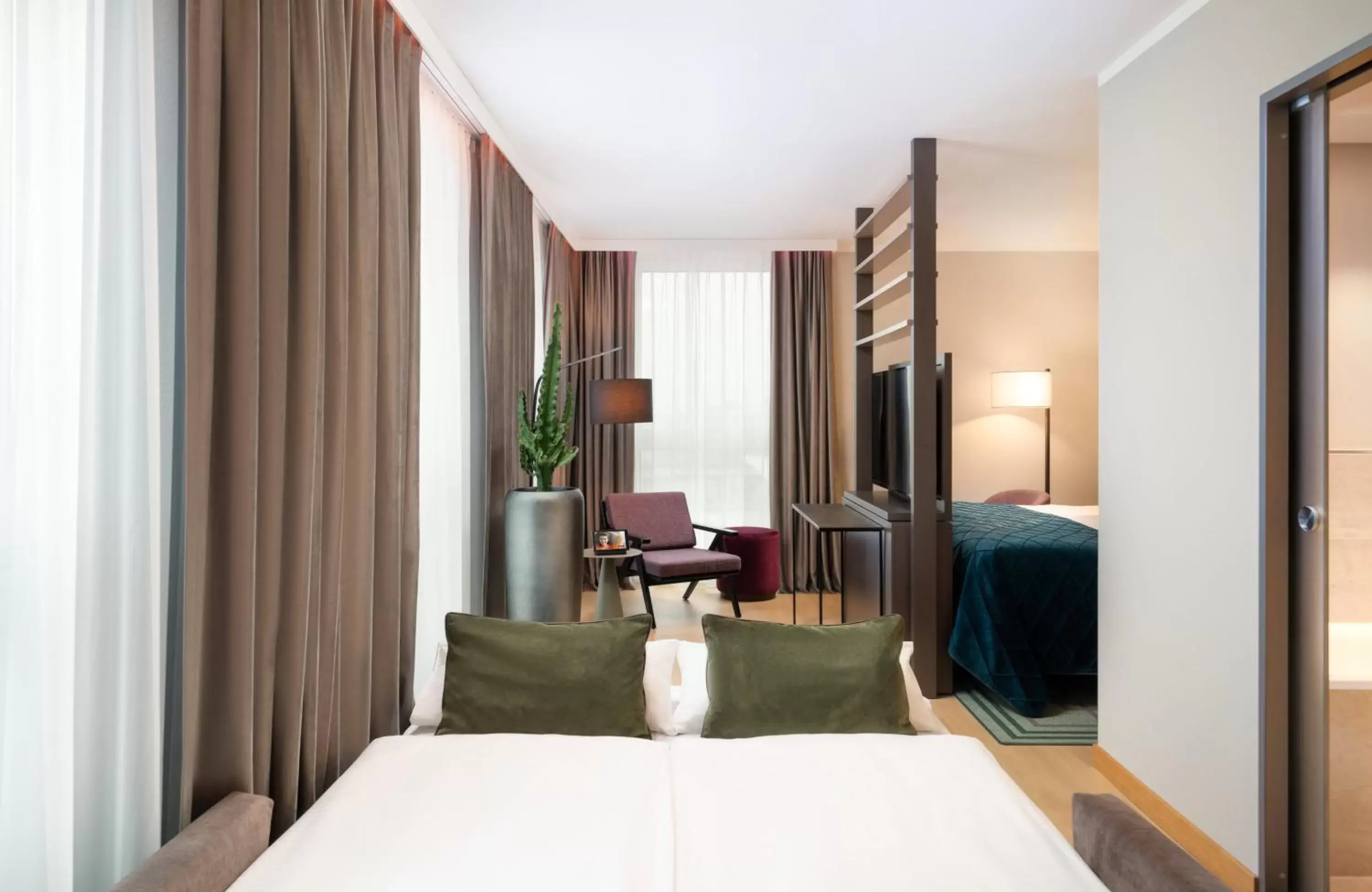 Photo of the whole room, Bed in Leonardo Royal Hotel Nürnberg