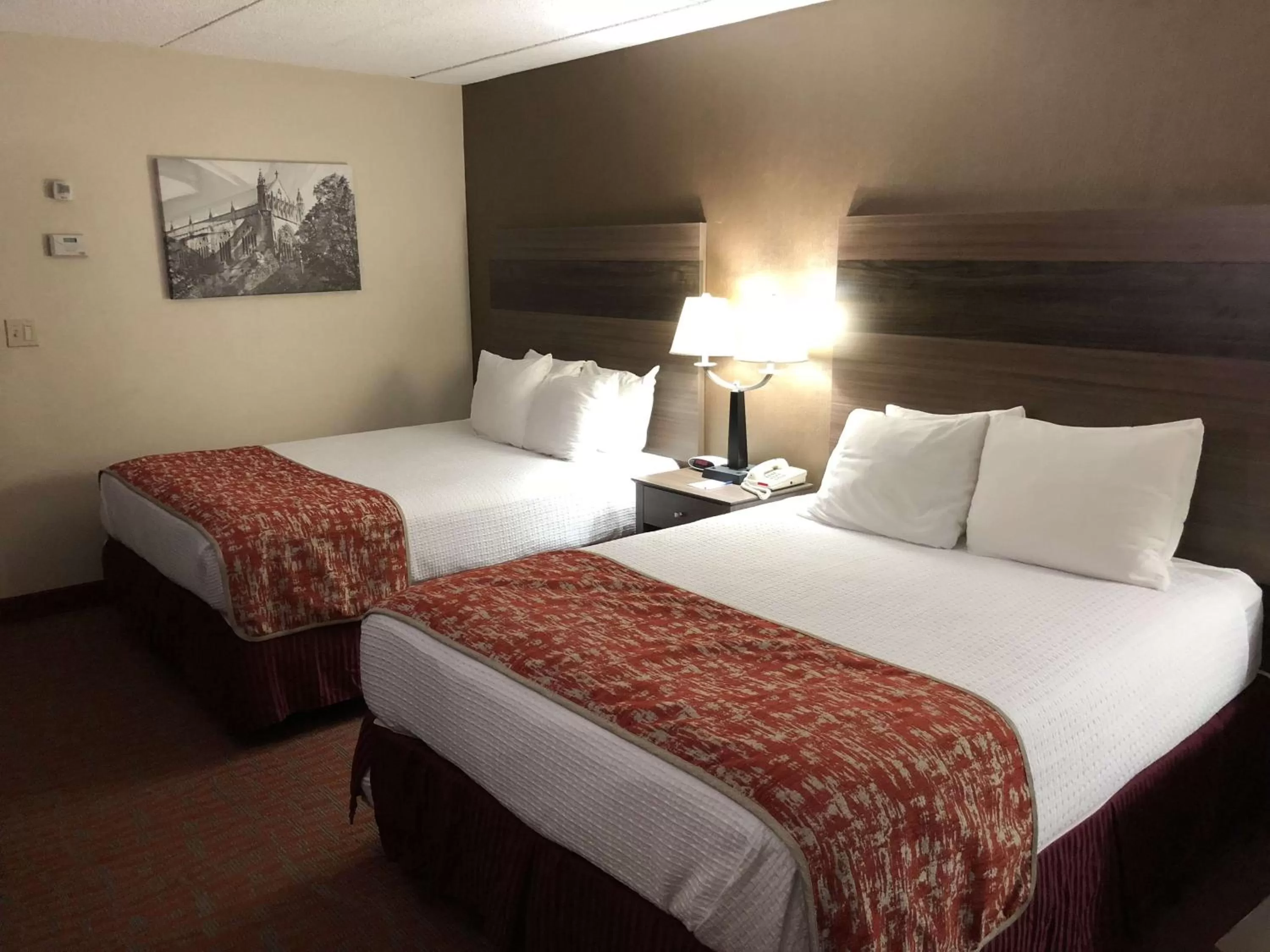 Photo of the whole room, Bed in MHO INN and SUITES