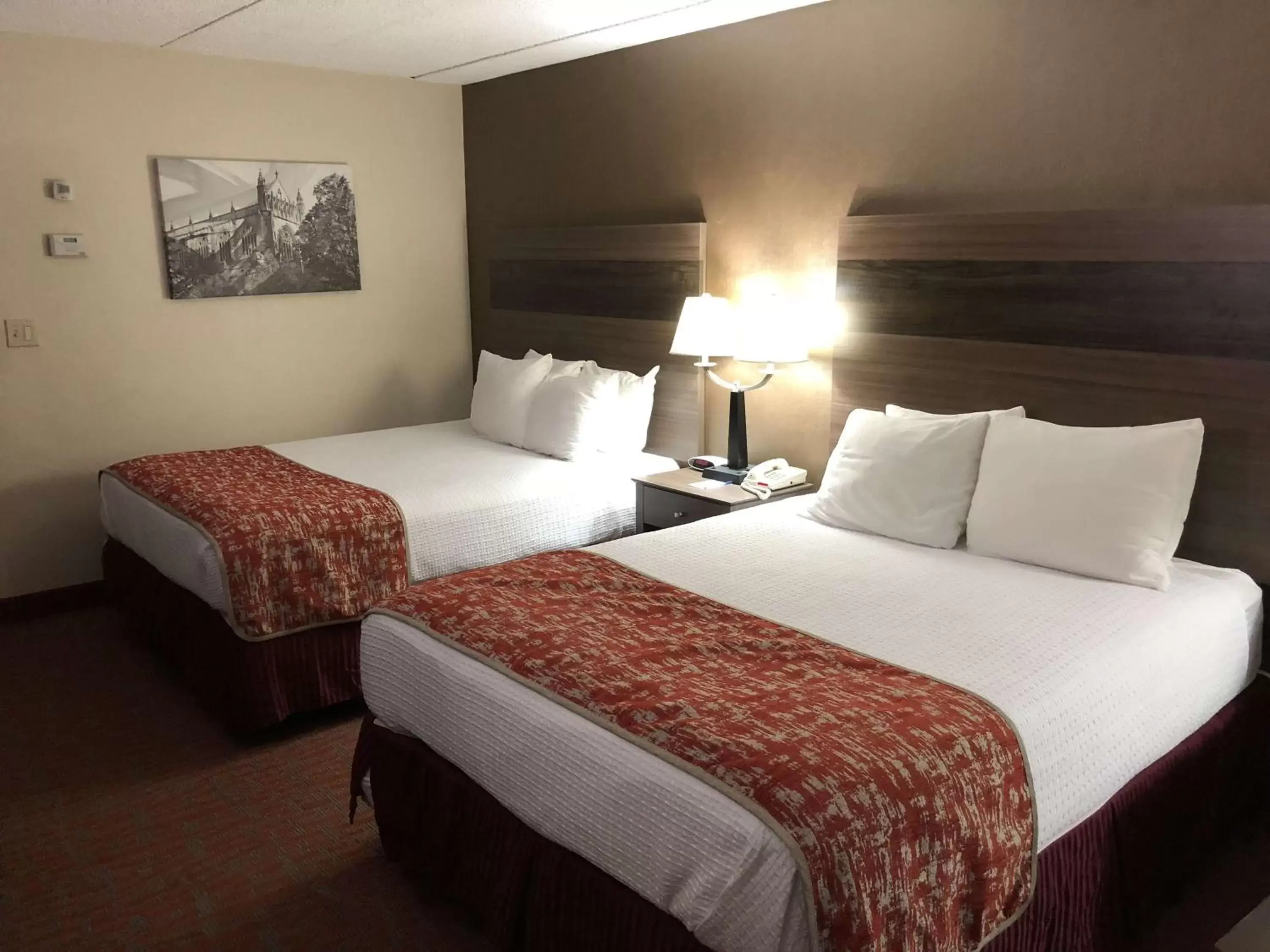 Photo of the whole room, Bed in MHO INN and SUITES
