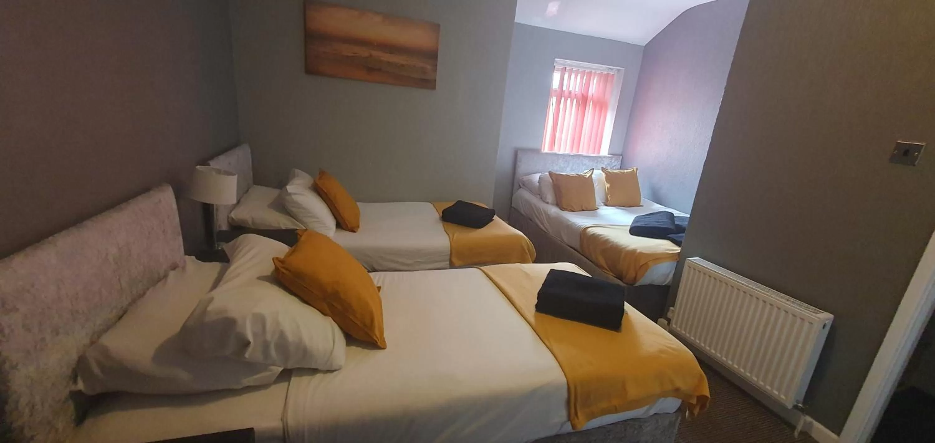 Bed in Palm Beach Hotel by the Sea