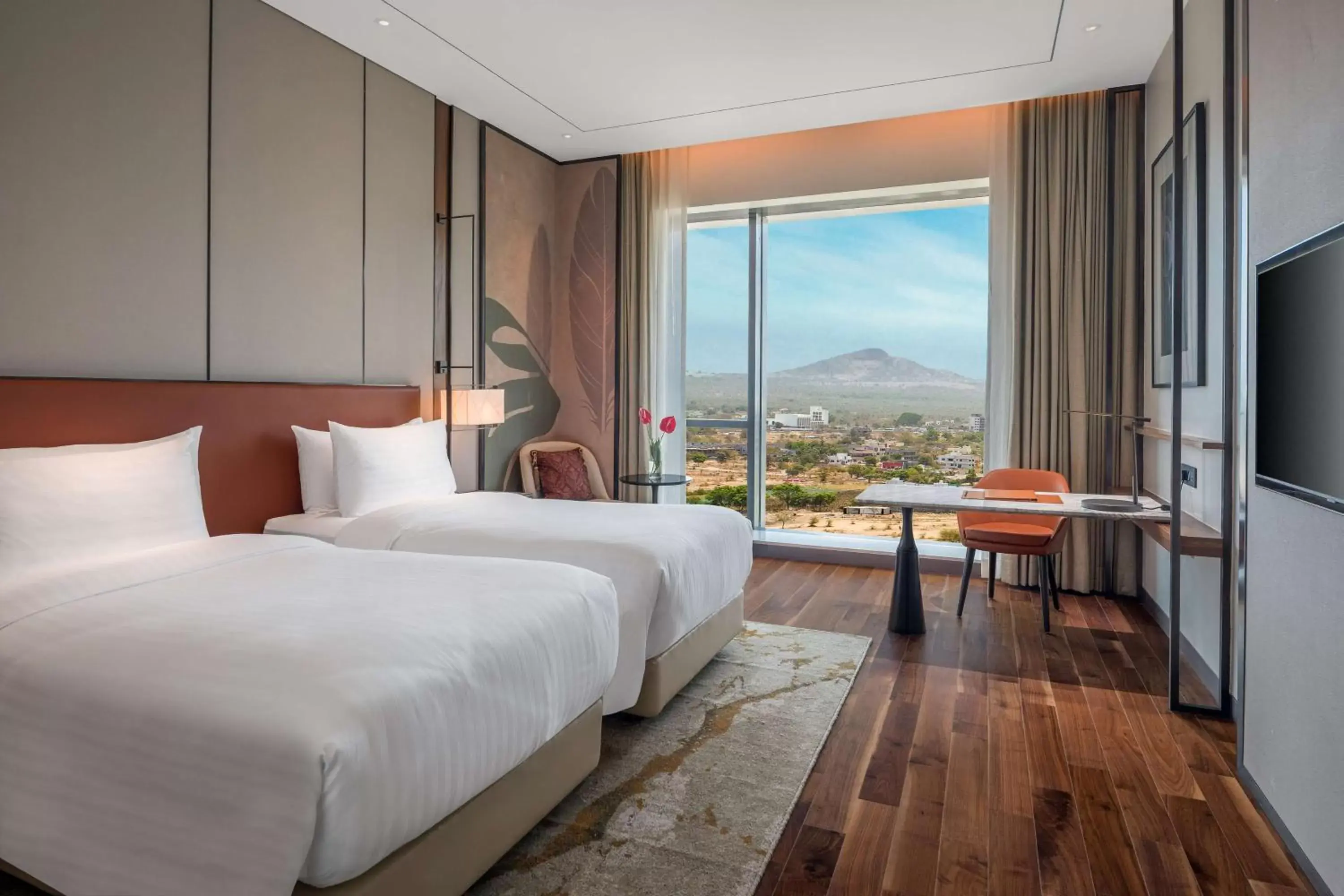 Bed, Mountain View in Radisson Blu Hotel & Spa, Nashik