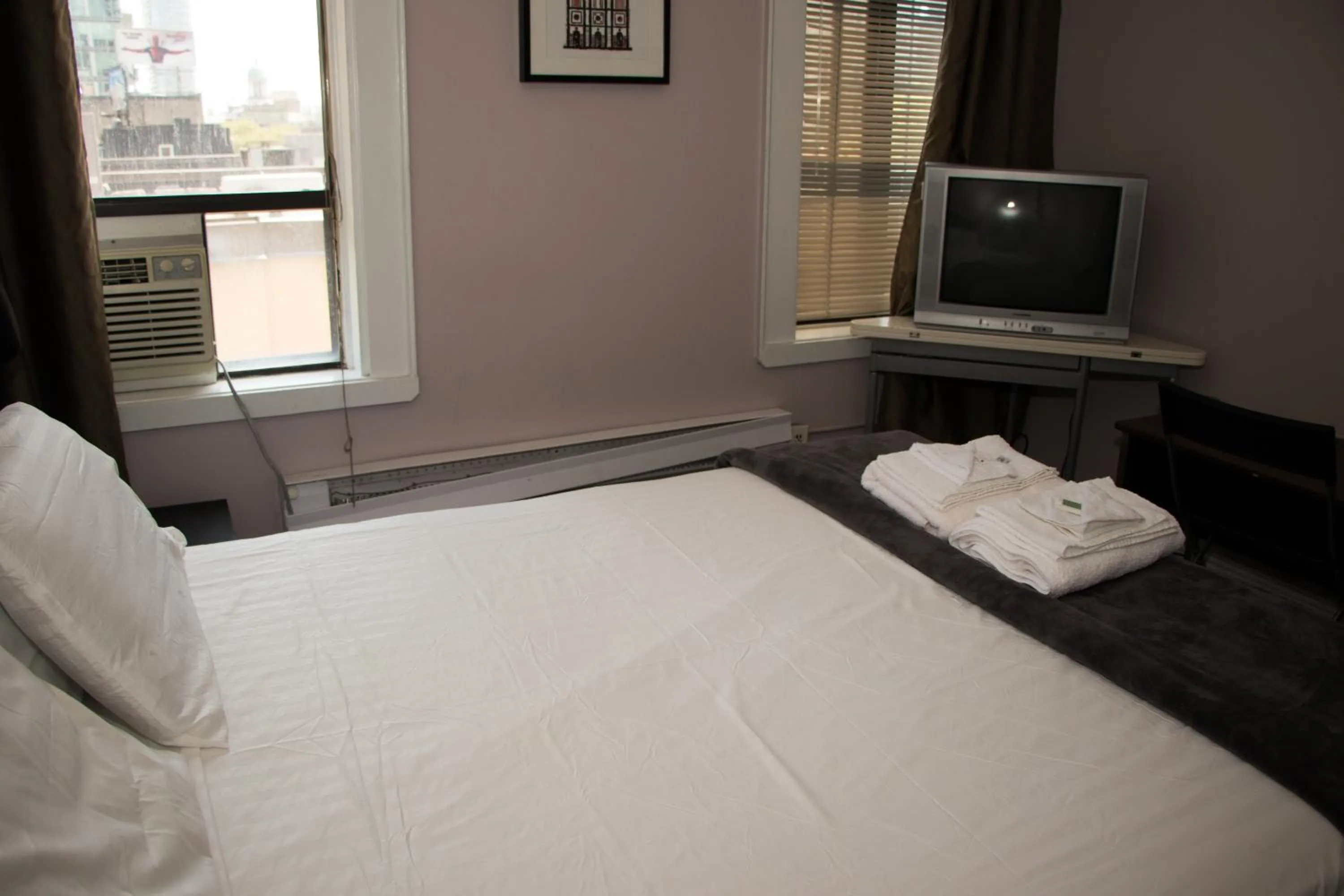 Bed in Saint Lawrence Residences and Suites