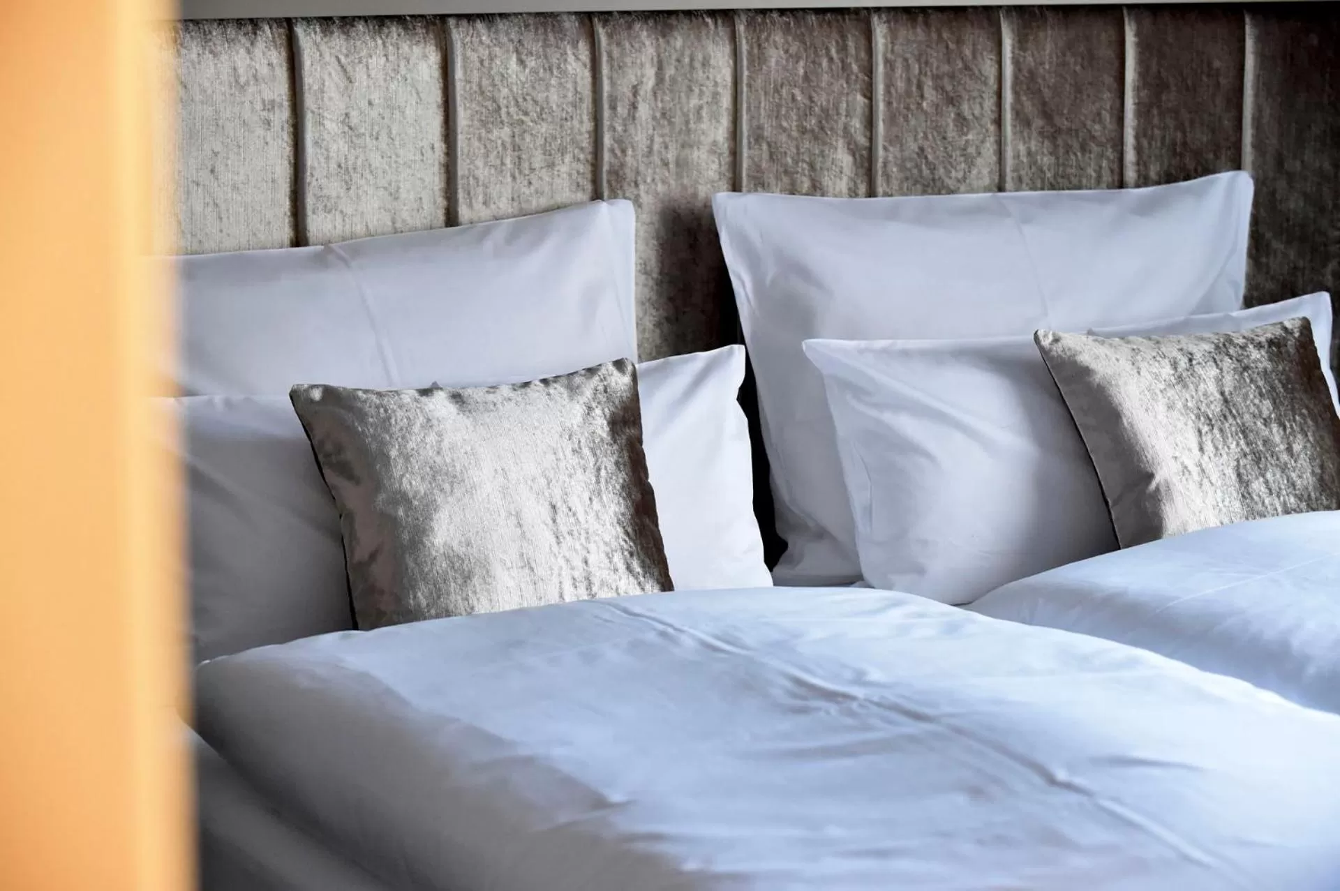 Decorative detail, Bed in MOMENTS Boutique Hotel