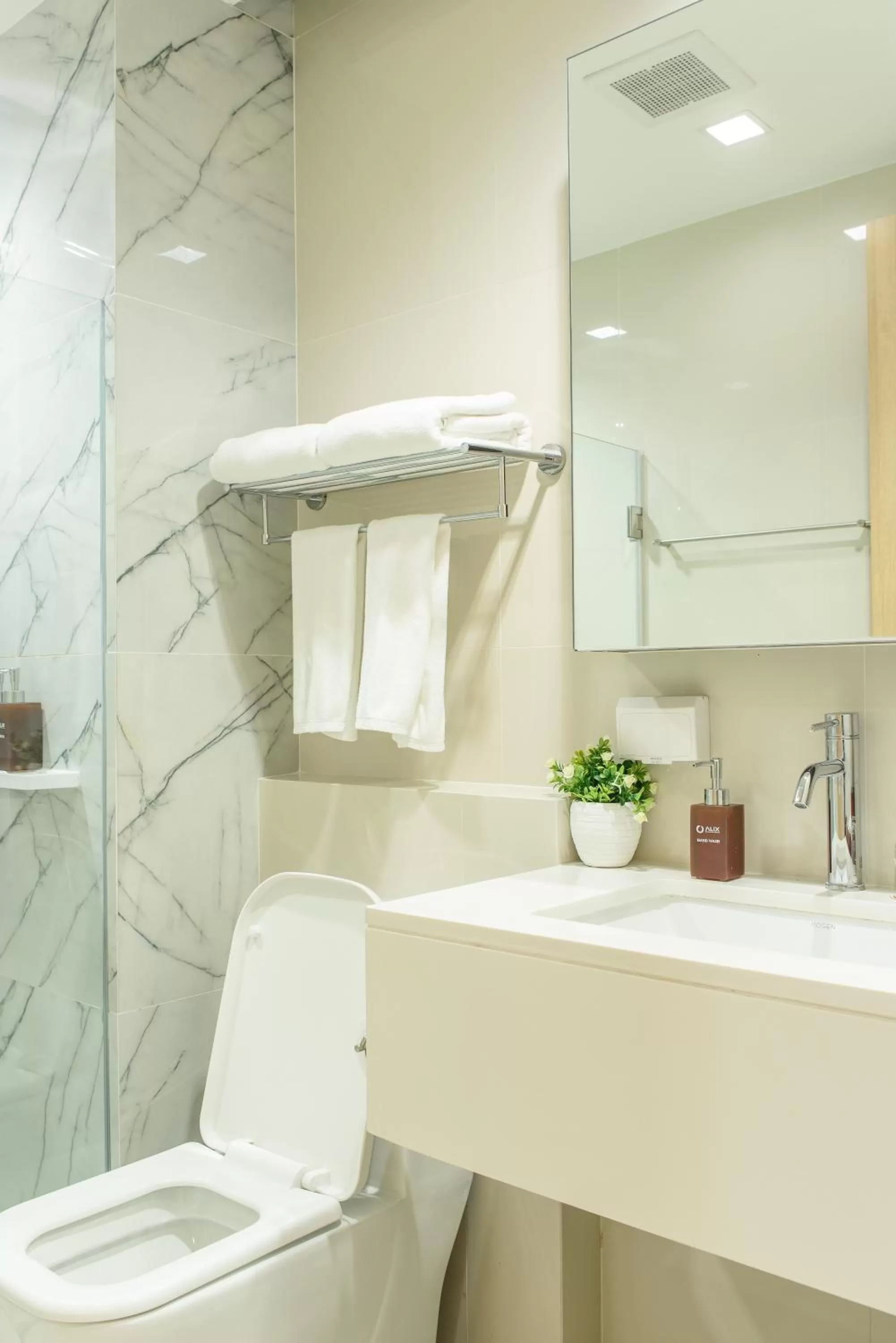Toilet in Alix Bangkok Hotel