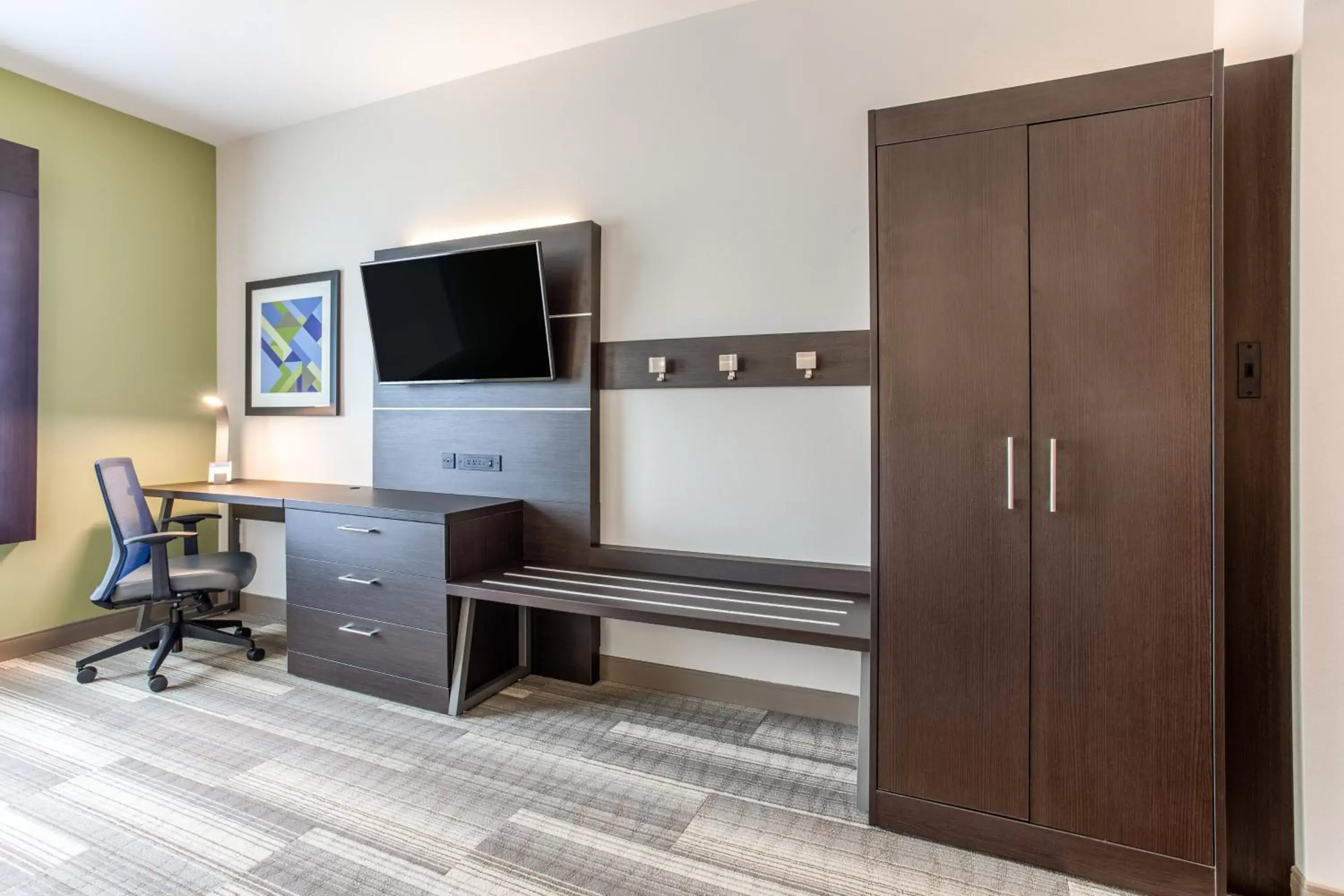 Photo of the whole room, TV/Entertainment Center in Holiday Inn Express & Suites - Ottawa, an IHG Hotel