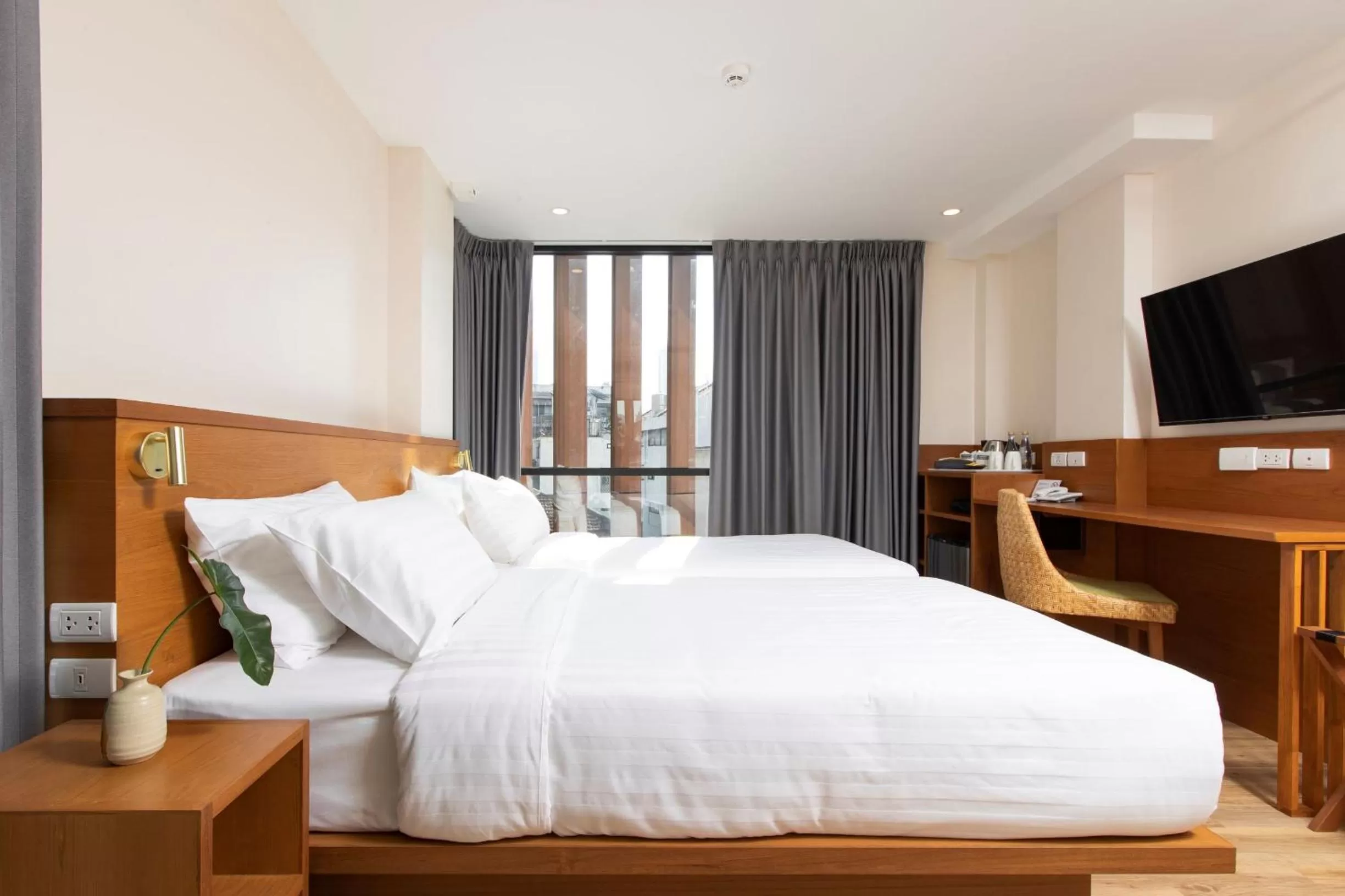 Photo of the whole room, Bed in Sukhon Hotel - SHA Plus