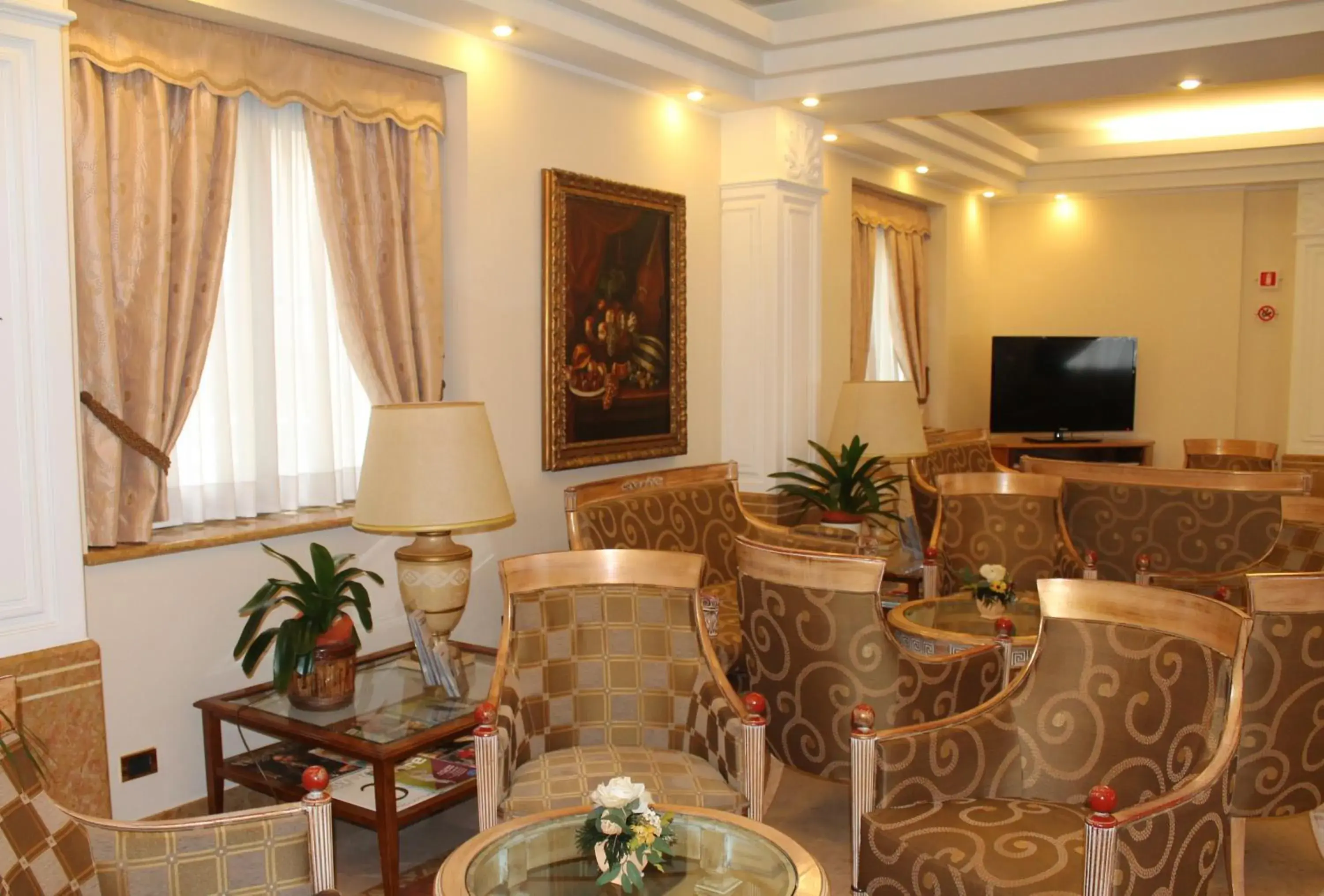 Communal lounge/ TV room, Seating Area in Hotel Mozart