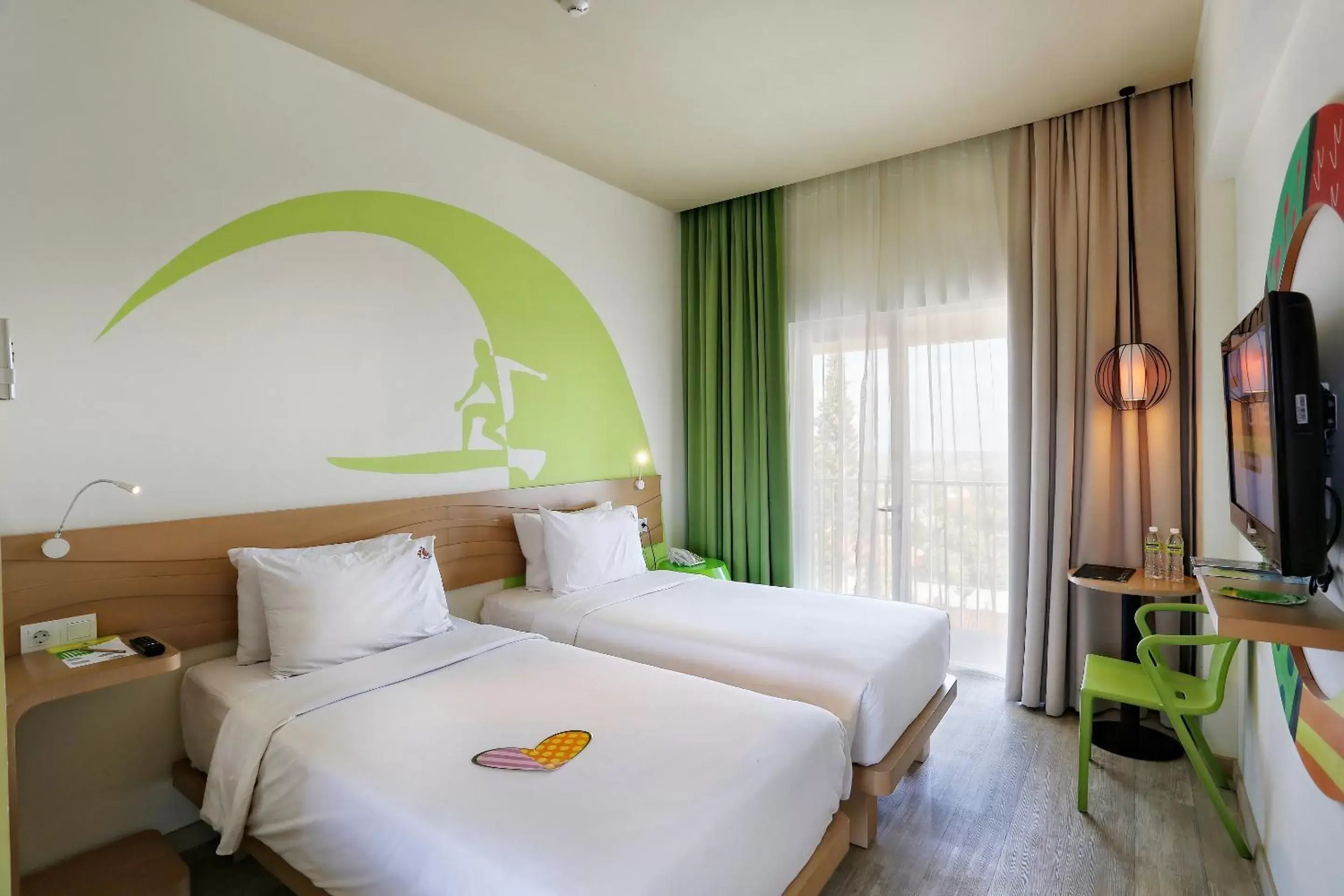 Bed in MaxOneHotels at Bukit Jimbaran Bed in MaxOneHotels at Bukit Jimbaran
